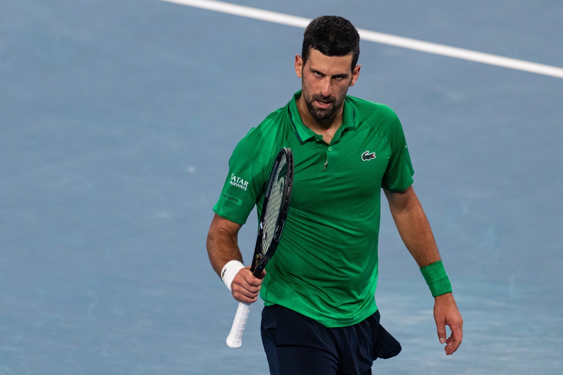 Novak Djokovic of Serbia in action against Jannik Sinner of Italy in the semifinals of the mens singles at the Australian Open at Rod Laver Arena in Melbourne Park.