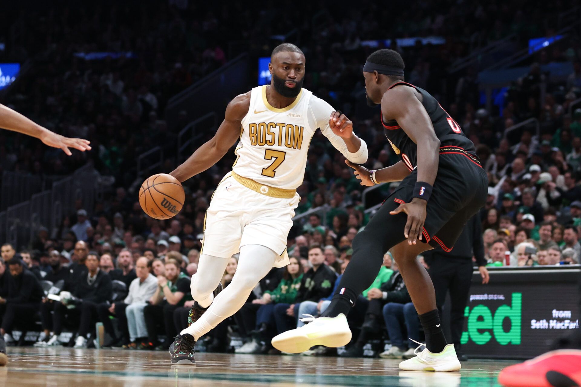 Boston Celtics forward Jaylen Brown (7) drives to the basket during the second half against the Philadelphia 76ers at TD Garden.