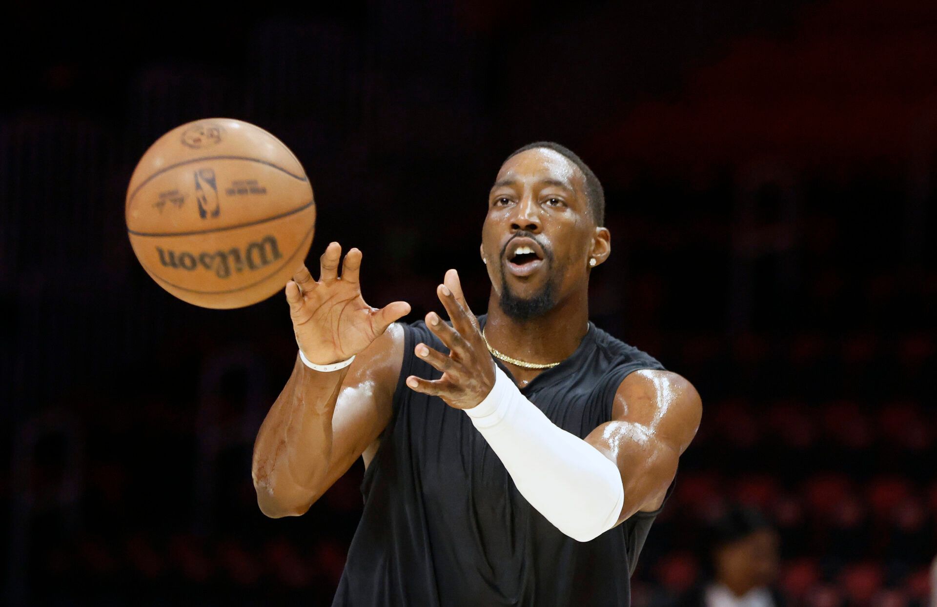 Miami Heat center Bam Adebayo (13) warms up against the Detroit Pistons at Kaseya Center.