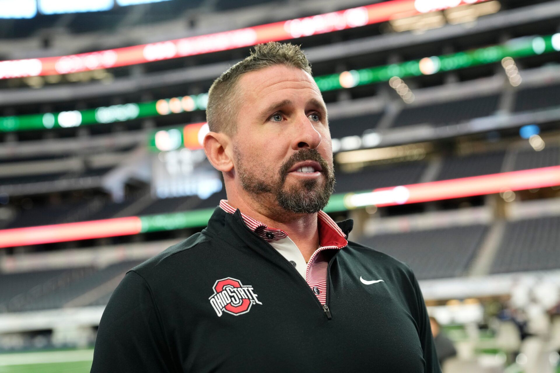 Ohio State Buckeyes offensive coordinator Brian Hartline speaks during the Cotton Bowl Media Day at AT&T Stadium in Dallas prior to the College Football Playoff matchup against the Miami Hurricanes on Dec. 29, 2025.