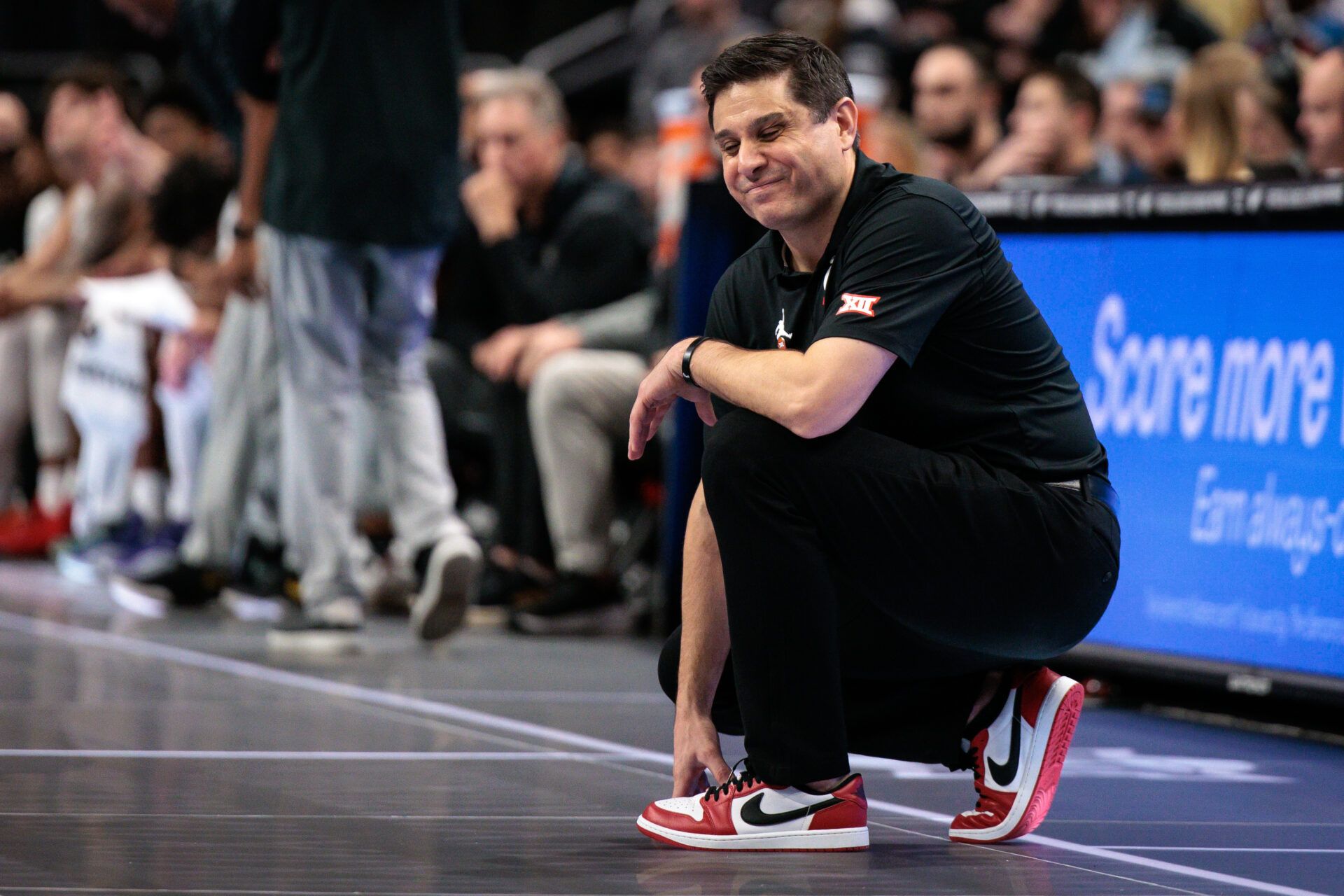 Cincinnati Bearcats coach Wes Miller reacts to game play during the second half against the UCF Knights at T-Mobile Center.