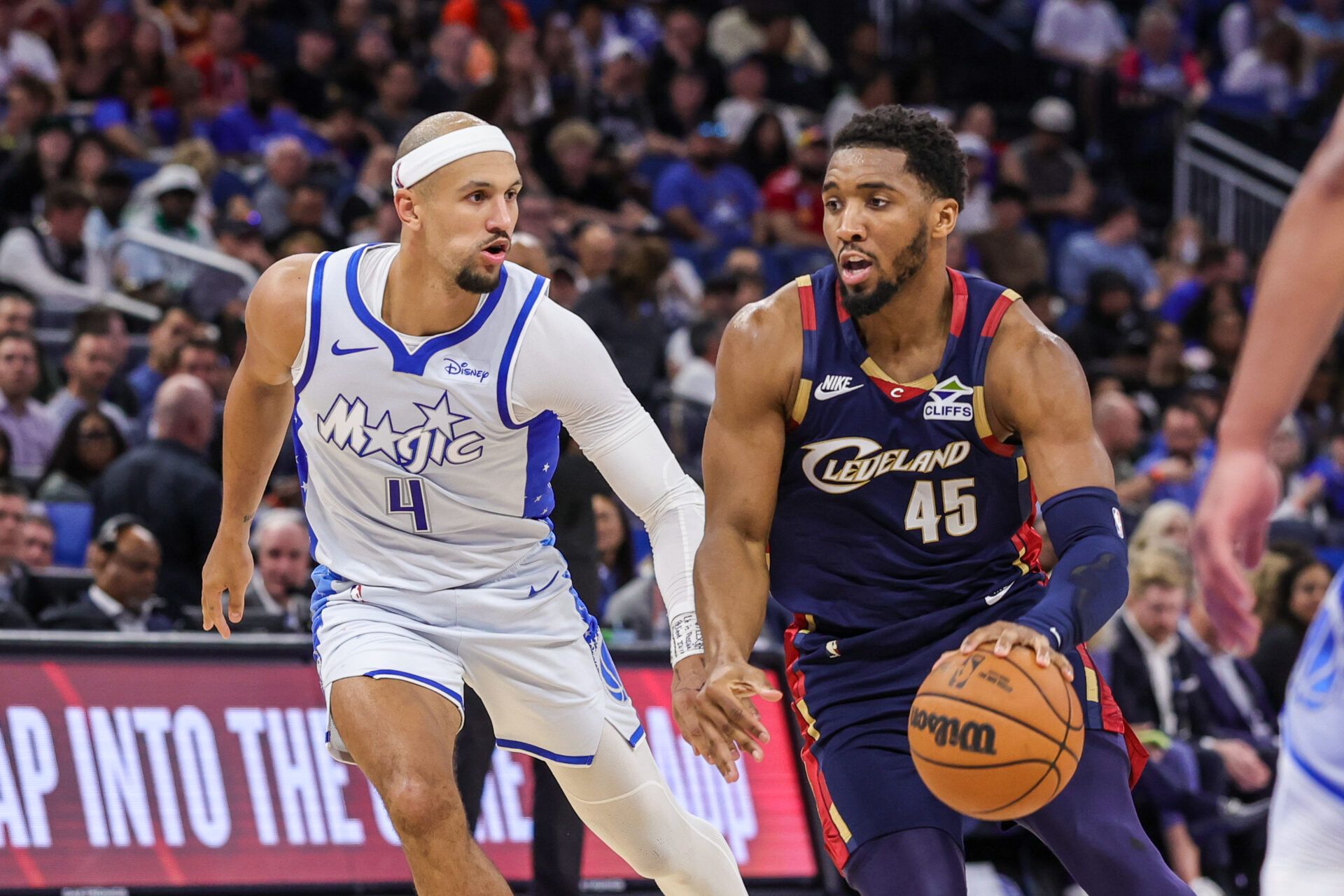Cleveland Cavaliers guard Donovan Mitchell (45) drives to the basket against Orlando Magic guard Jalen Suggs (4) during the second half at Kia Center.