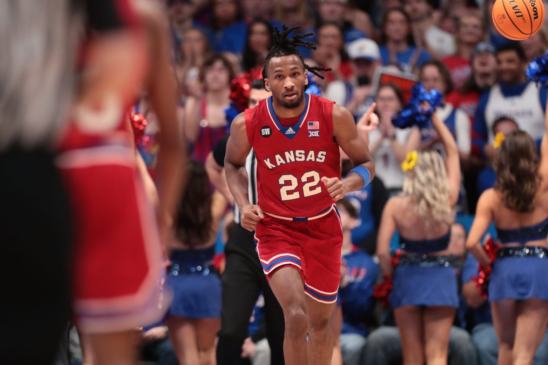 Kansas Jayhawks guard Darryn Peterson (22) looks back after scoring against Kansas State Wildcats during the Sunflower Showdown game inside Allen Fieldhouse in Lawrence, Kansas, on Saturday, March 7, 2026.