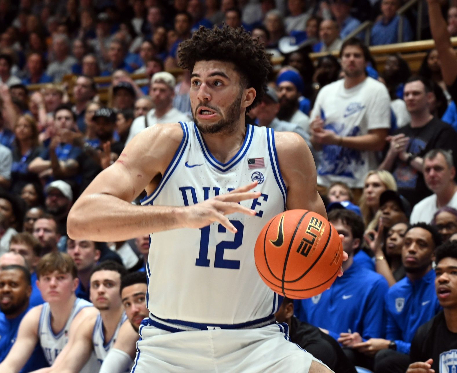 Duke Blue Devils forward Cameron Boozer (12) controls the ball during the second half against the North Carolina Tar Heels at Cameron Indoor Stadium.  The Duke Blue Devils won 76-61.