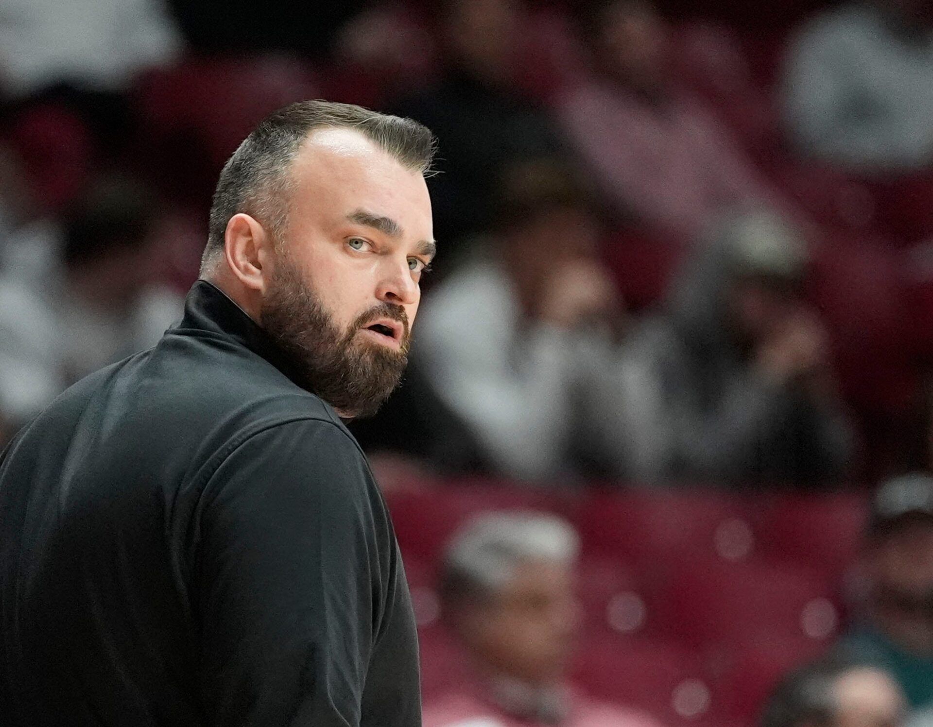 South Florida head coach Bryan Hodgson coaches his USF team against Alabama at Coleman Coliseum.