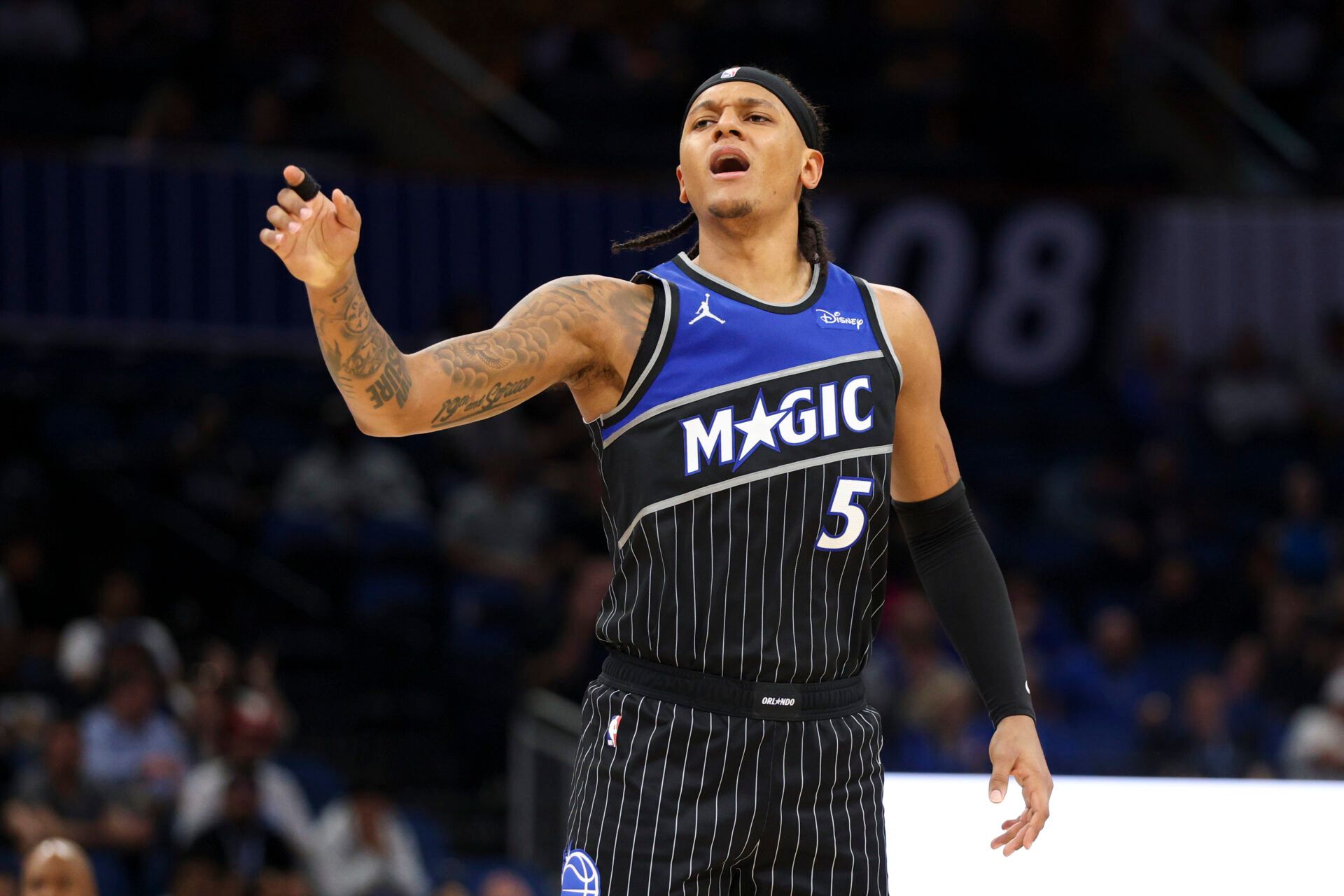 Orlando Magic forward Paolo Banchero (5) reacts after a play against the Dallas Mavericks in the fourth quarter at Kia Center.