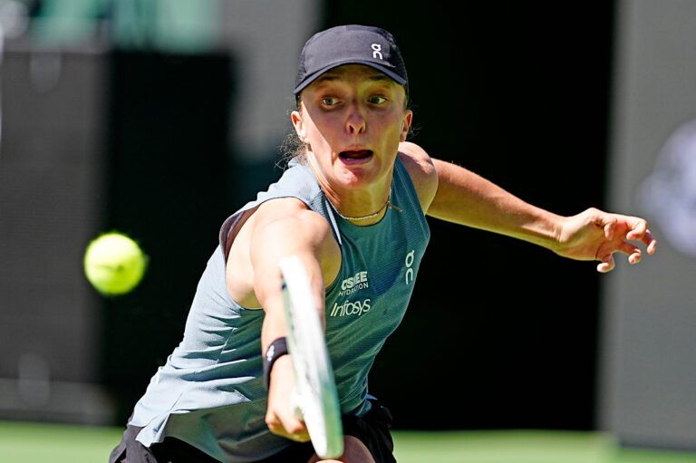 Iga Swiatek defeated Karolina Muchova 6-2, 6-0 in their BNP Paribas Open fourth-round match in Indian Wells, Calif., on Wednesday, March 11, 2026.