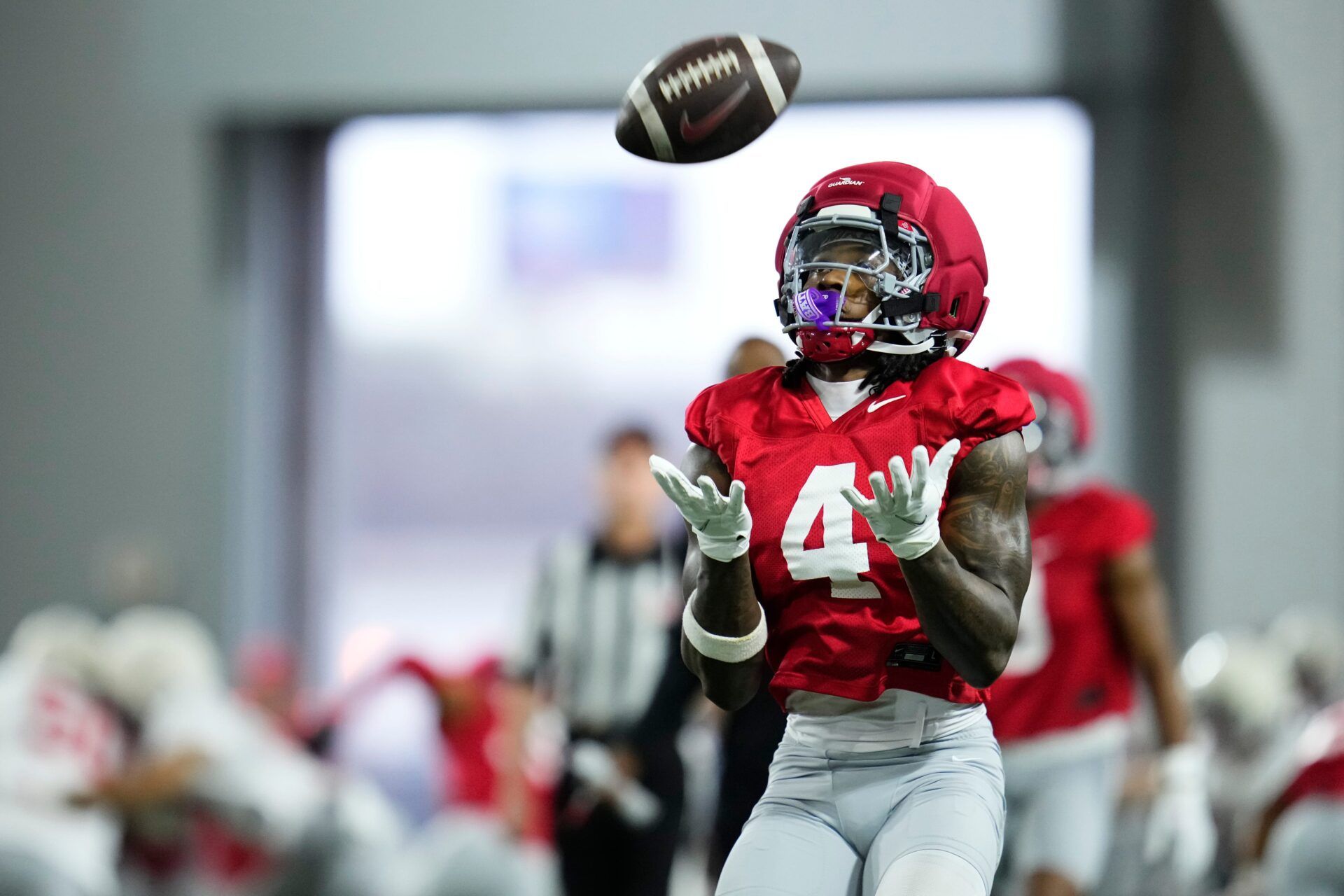 Ohio State Buckeyes wide receiver Jeremiah Smith (4) catches a punt during the first day of spring workouts for the 2026 football season at Woody Hayes Athletic Complex in Columbus on March 10, 2026.