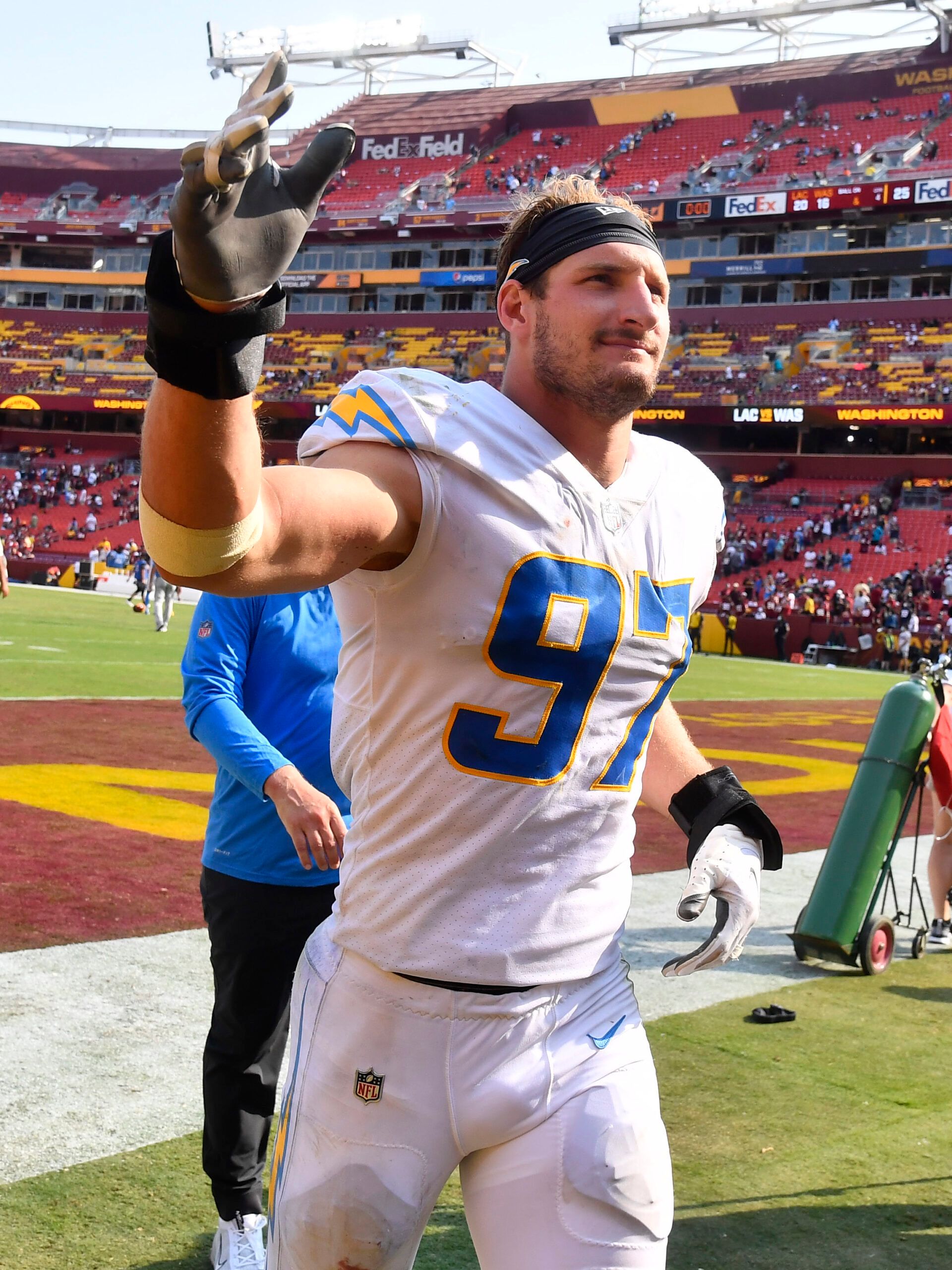 Los Angeles Chargers defensive end Joey Bosa (97) celebrates after the game against the Washington Football Team  at FedExField.
