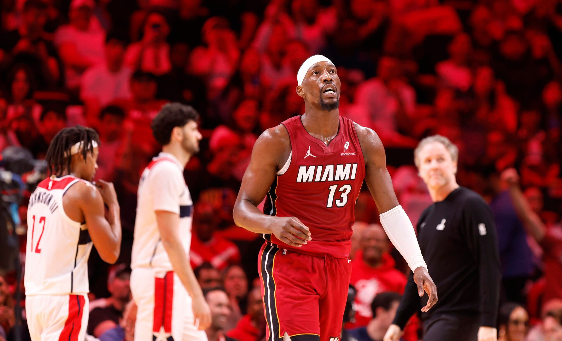 Miami Heat center Bam Adebayo (13) walks back to the bench during a time out against the Washington Wizards during the second half at Kaseya Center.