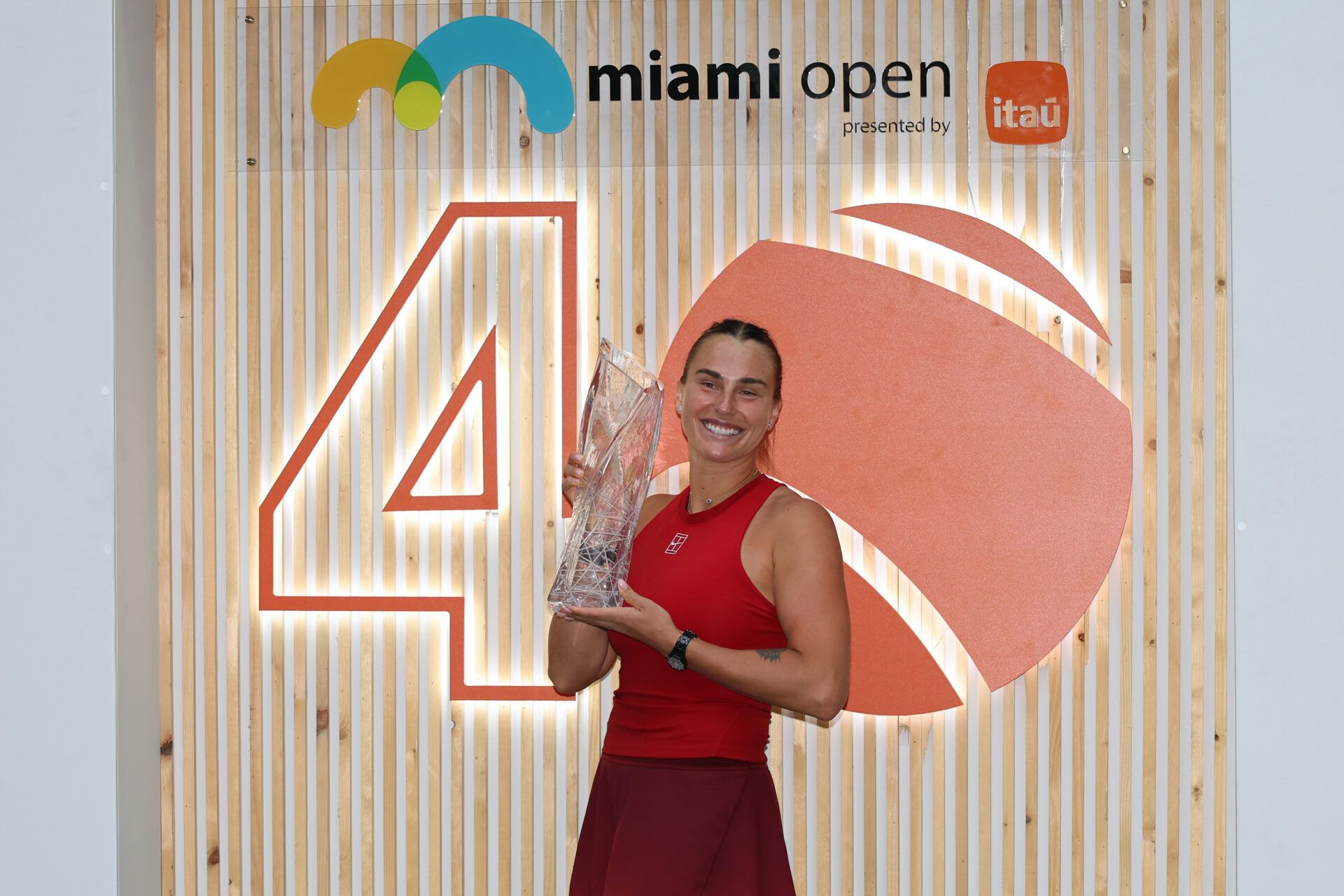 Aryna Sabalenka poses for a portrait with the Butch Buchholz trophy after her match against Jessica Pegula (USA)(not pictured) in the women's singles championship of the Miami Open at Hard Rock Stadium.