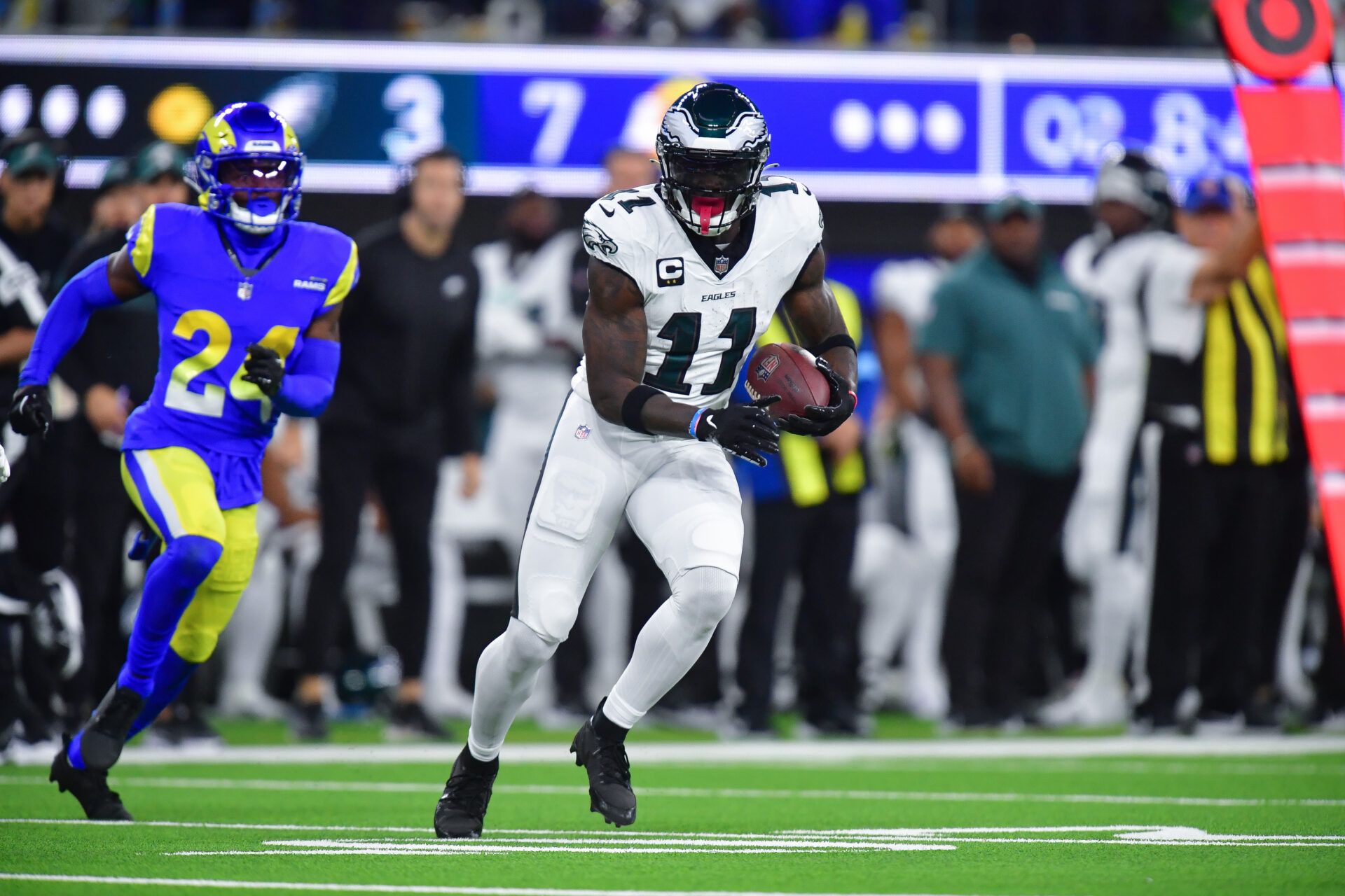 Philadelphia Eagles wide receiver A.J. Brown (11) runs the ball against the Los Angeles Rams during the first half at SoFi Stadium.