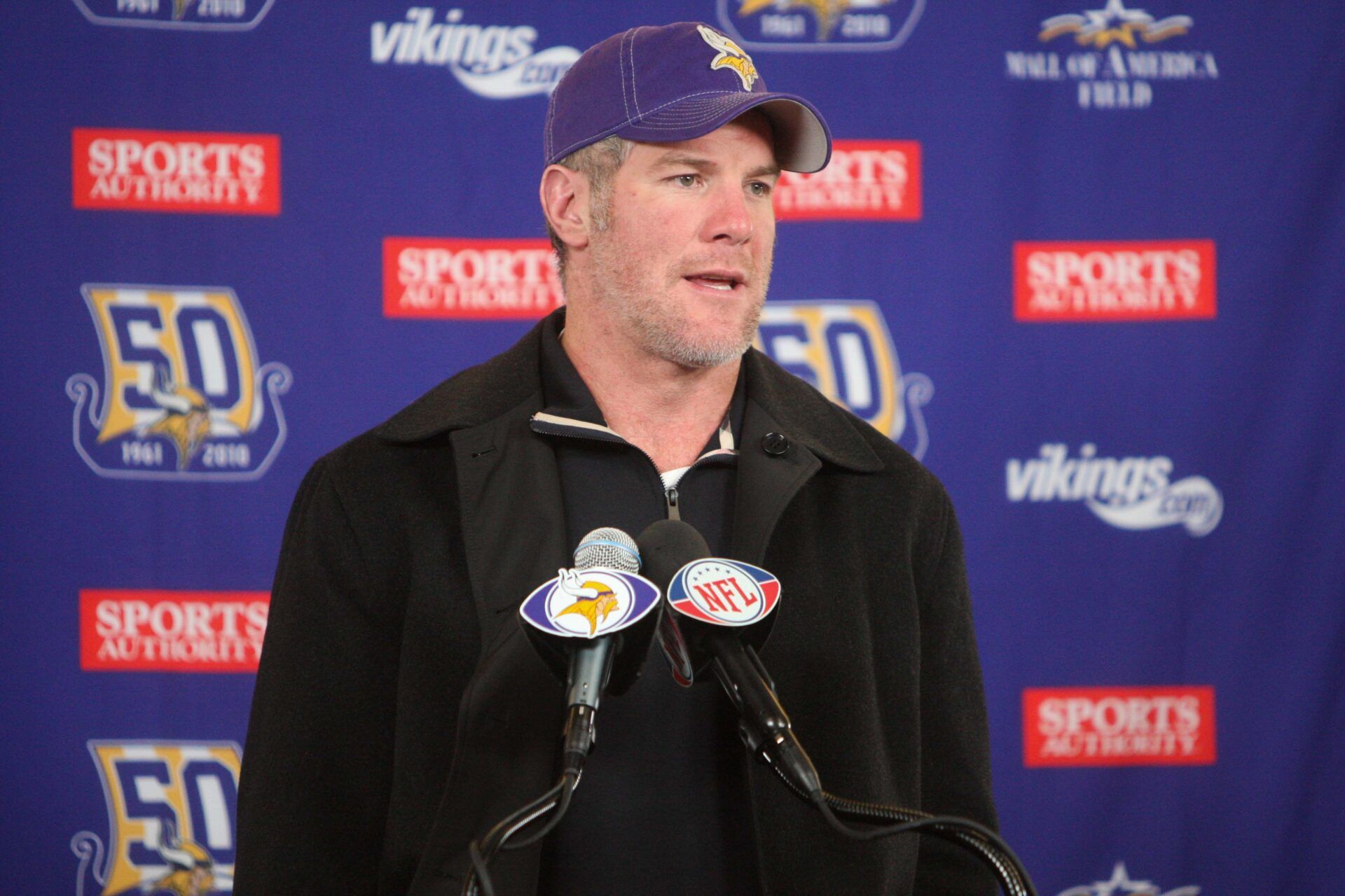 Minnesota Vikings quarterback Brett Favre (4) speaks to the media following the game against the Chicago Bears at TCF Bank Stadium. The Bears defeated the Vikings 40-14.