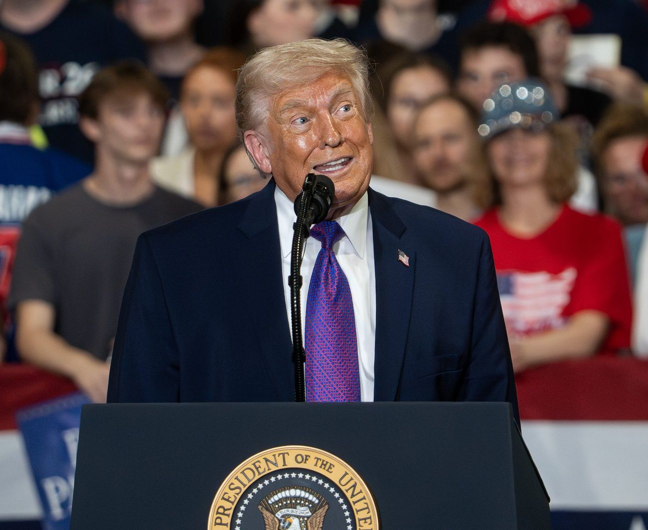 U.S. President Donald Trump jokes with the crowd while speaking during an event at Verst Logistics on March 11, 2026 in Hebron, Kentucky.
