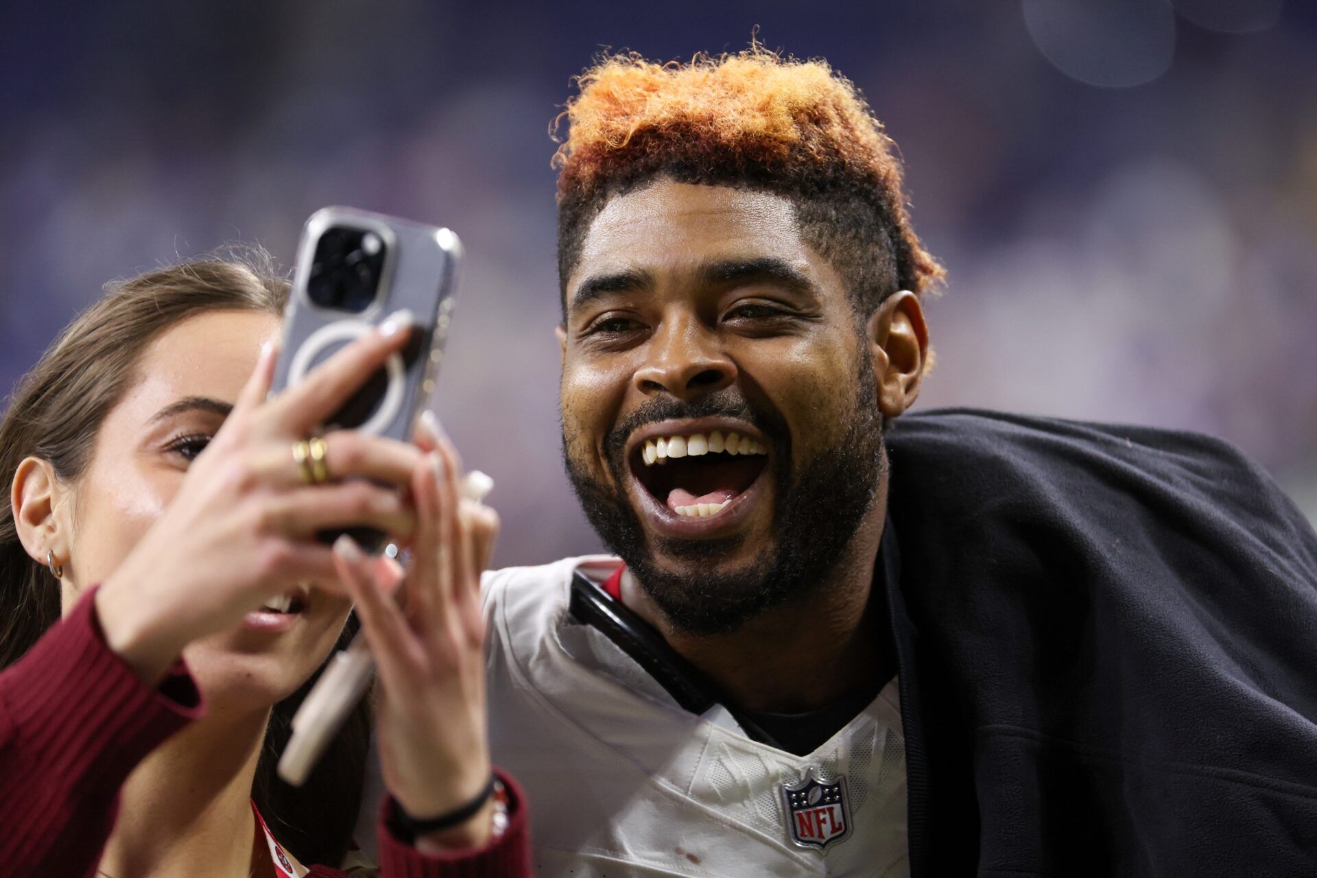 San Francisco 49ers wide receiver Jauan Jennings (15) takes a selfie after the game against the Indianapolis Colts at Lucas Oil Stadium.