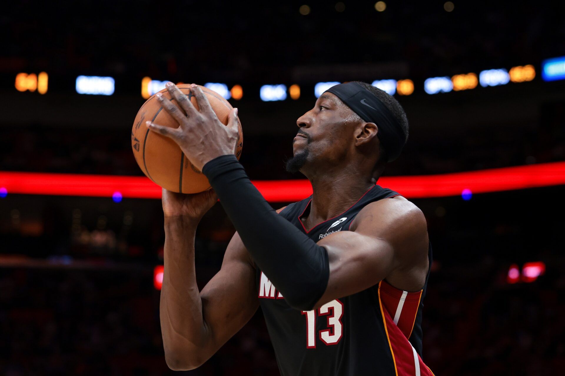 Miami Heat center Bam Adebayo (13) shoots the basketball against the Milwaukee Bucks during the third quarter at Kaseya Center.