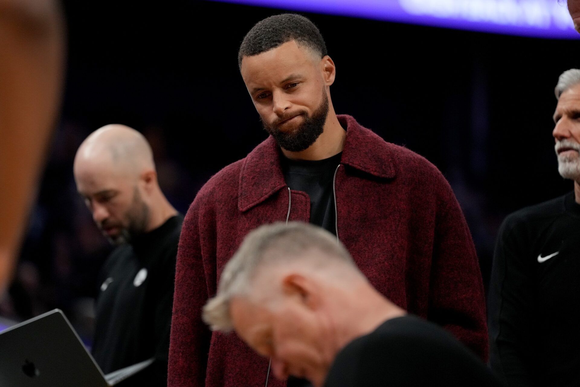 Golden State Warriors guard Stephen Curry (30) stands near the team bench during a timeout against the Minnesota Timberwolves in the third quarter at the Chase Center.