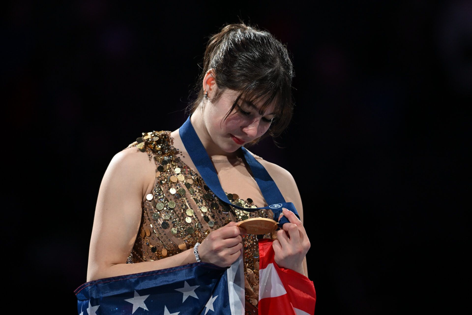 Alysa Liu (USA) celebrates winning gold in Womens Free Skating during the ISU World Figure Skating Championships at TD Garden.