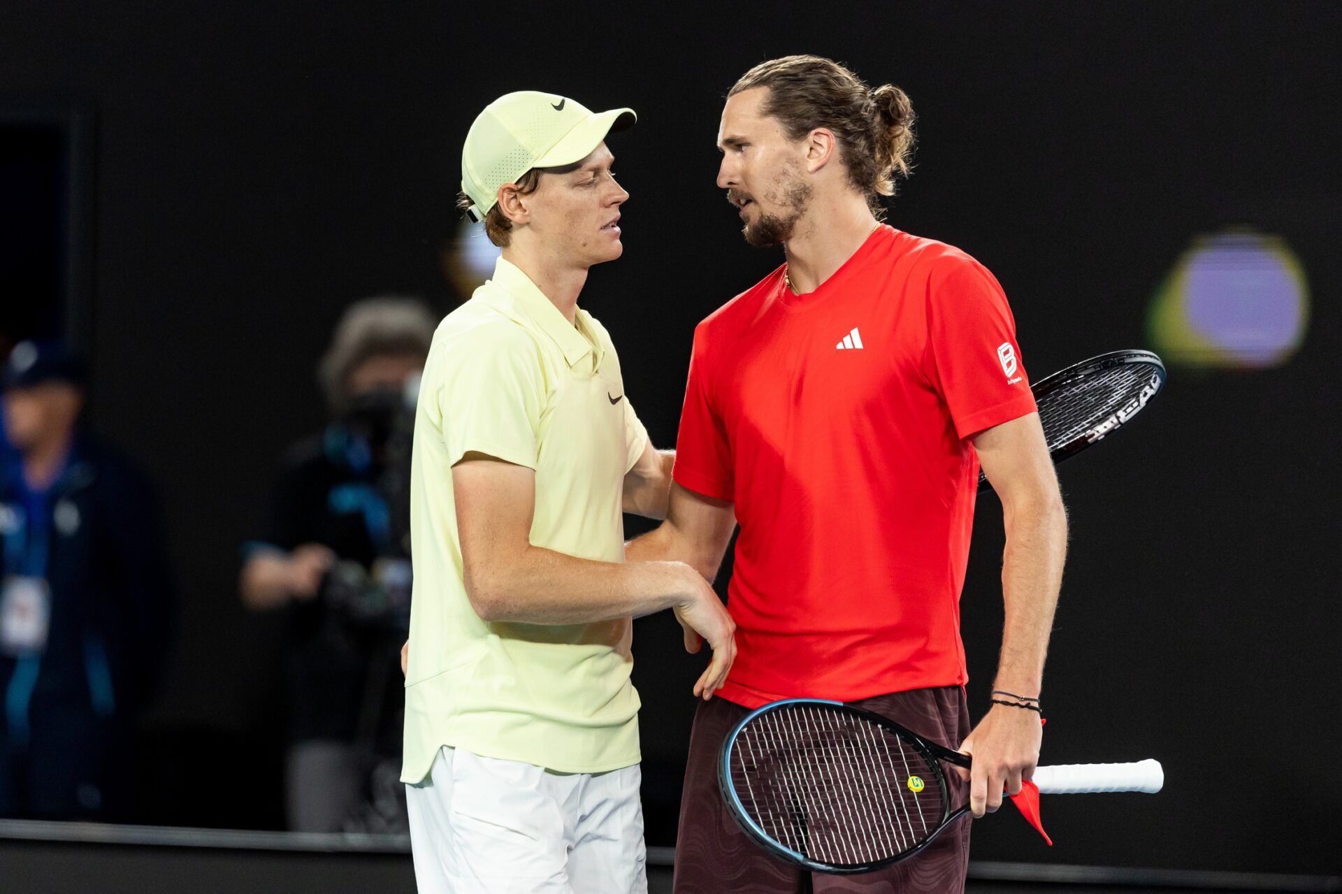 Jannik Sinner of Italy and Alexander Zverev of Germany shake hands after their match in the final of the men's singles at the 2025 Australian Open at Melbourne Park.