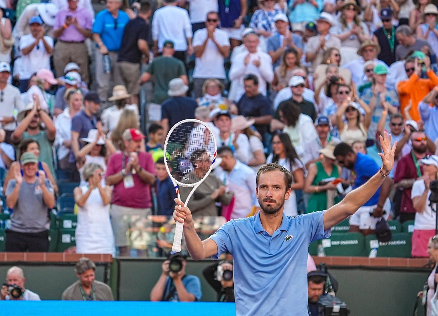 Daniil Medvedev waves to the crowd after defeating Carlos Alcaraz during their semifinal match at the BNP Paribas Open in Indian Wells, Calif., Saturday, March 14, 2026.