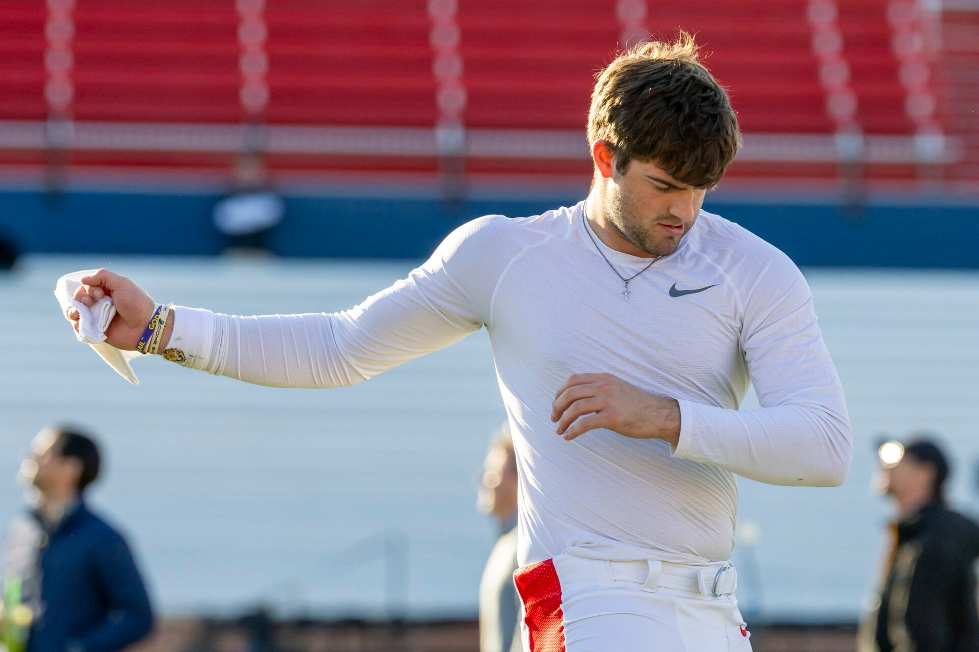 American quarterback Garrett Nussmeier (13) of LSU warms up before American Senior Bowl practice at Hancock Whitney Stadium.