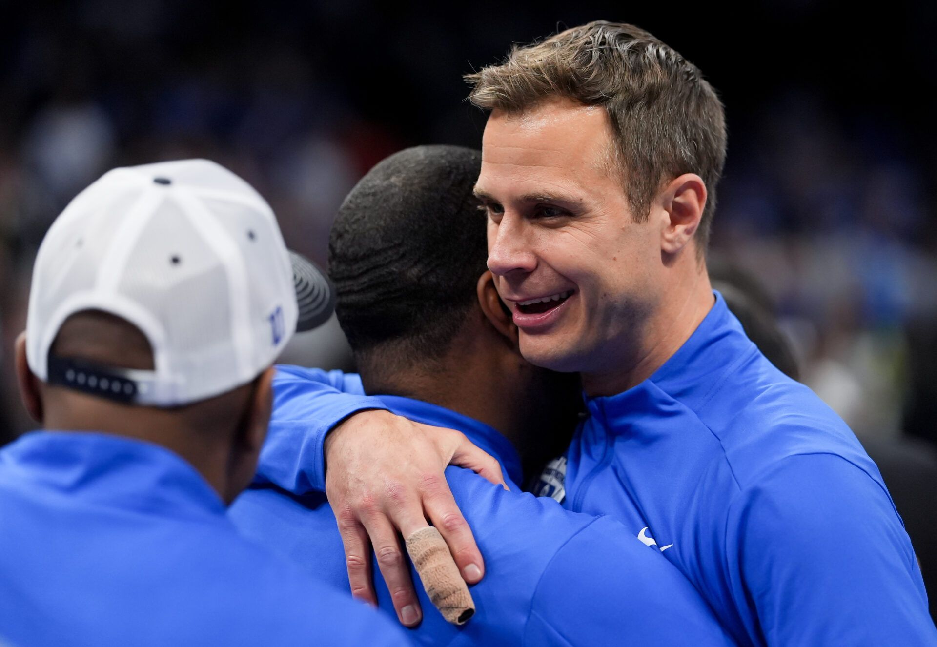 Duke Blue Devils head coach Jon Scheyer celebrates after defeating the Virginia Cavaliers in the men's ACC Conference Tournament Championship at Spectrum Center.