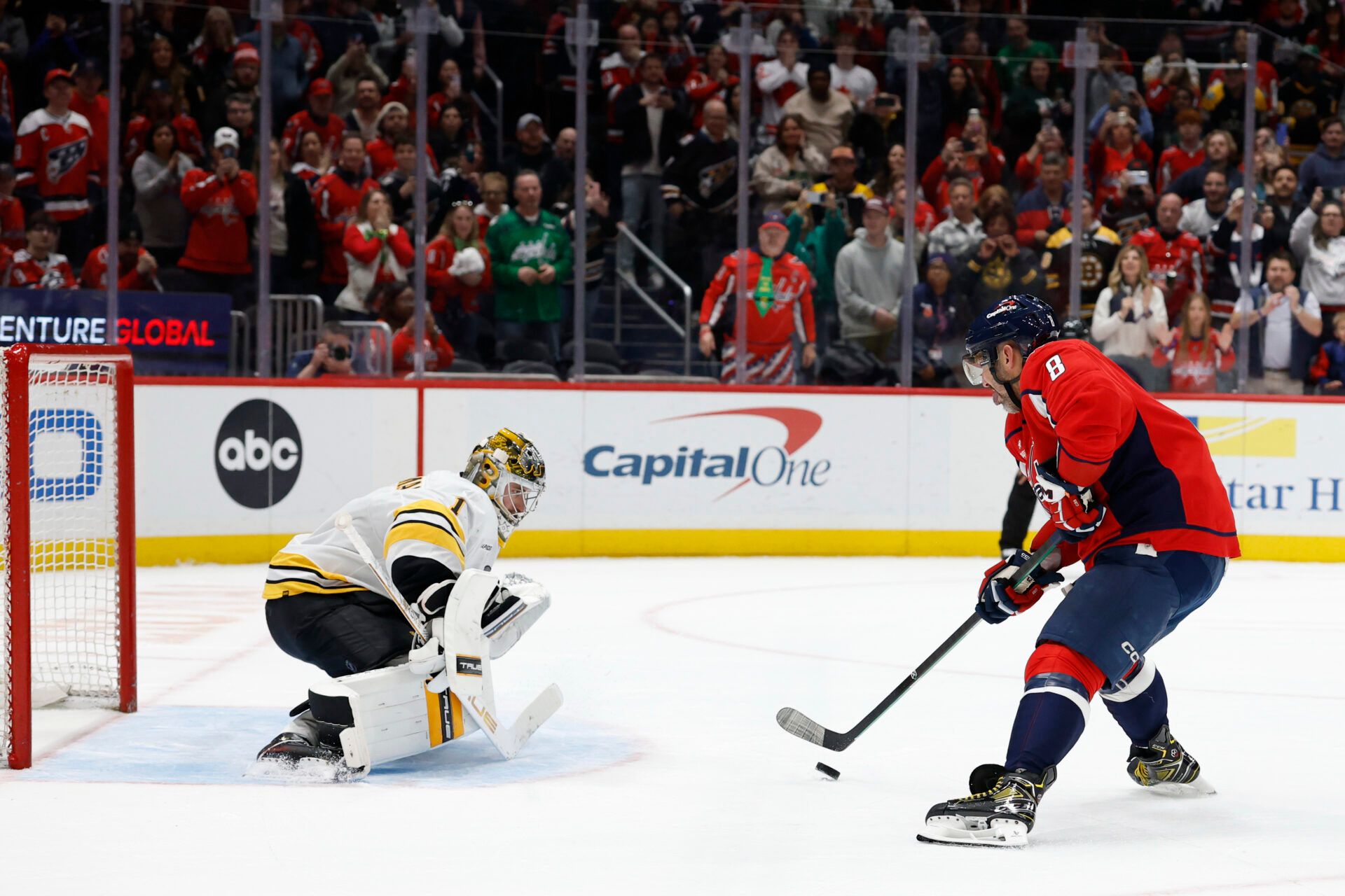 Washington Capitals left wing Alex Ovechkin (8) is stopped on his shootout attempt by Boston Bruins goaltender Jeremy Swayman (1) at Capital One Arena.