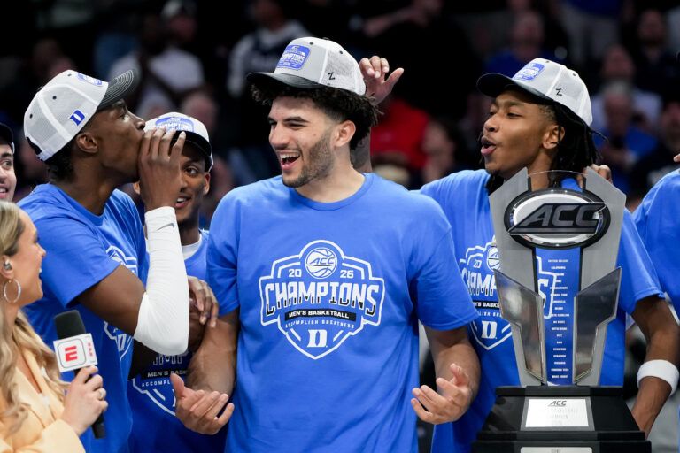 Duke Blue Devils forward Cameron Boozer (12) reacts after being named tournament MVP after defeating the Virginia Cavaliers in the men's ACC Conference Tournament Championship at Spectrum Center.
