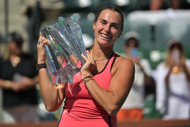 Aryna Sabalenka (BEL) celebrates with the championship trophy after winning the women’s final of the BNP Paribas Open defeating Elena Rybakina (KAZ) at the Indian Wells Tennis Garden.