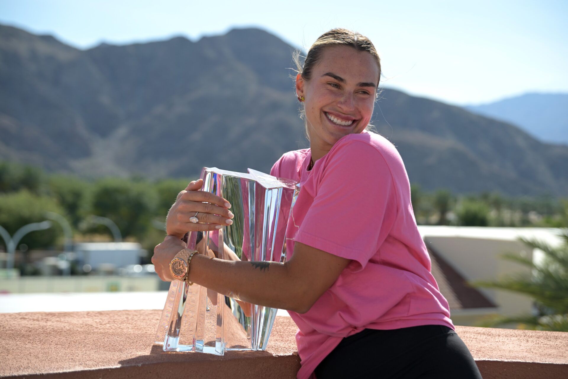 Aryna Sabalenka (BEL) holds the championship trophy after winning the womenÕs final of the BNP Paribas Open defeating Elena Rybakina (KAZ) at the Indian Wells Tennis Garden.