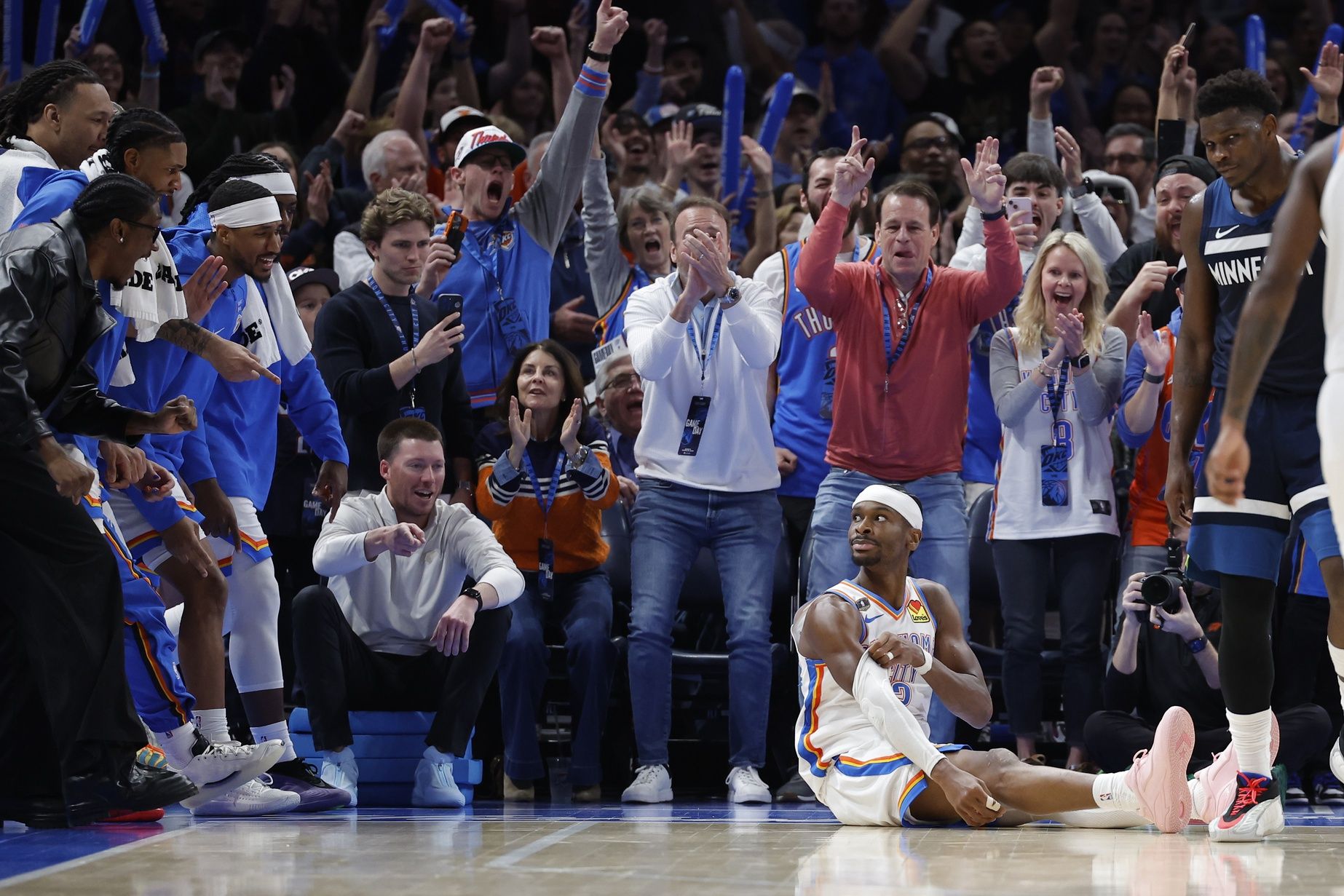 Oklahoma City Thunder guard Shai Gilgeous-Alexander (2) looks up at his teammates after scoring against the Minnesota Timberwolves during the second half at Paycom Center.