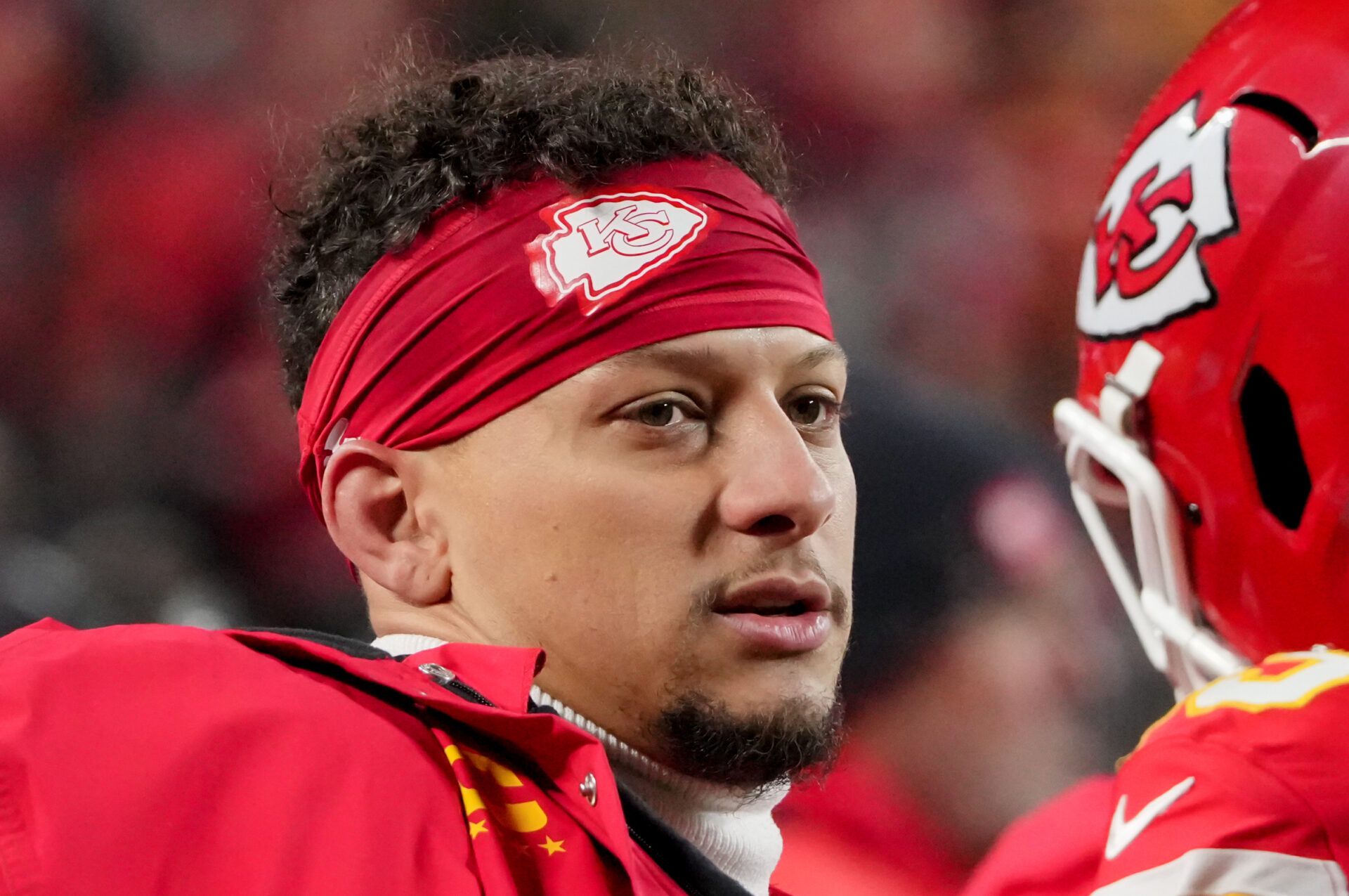Kansas City Chiefs quarterback Patrick Mahomes (15) looks on during the third quarter against the Houston Texans at GEHA Field at Arrowhead Stadium.
