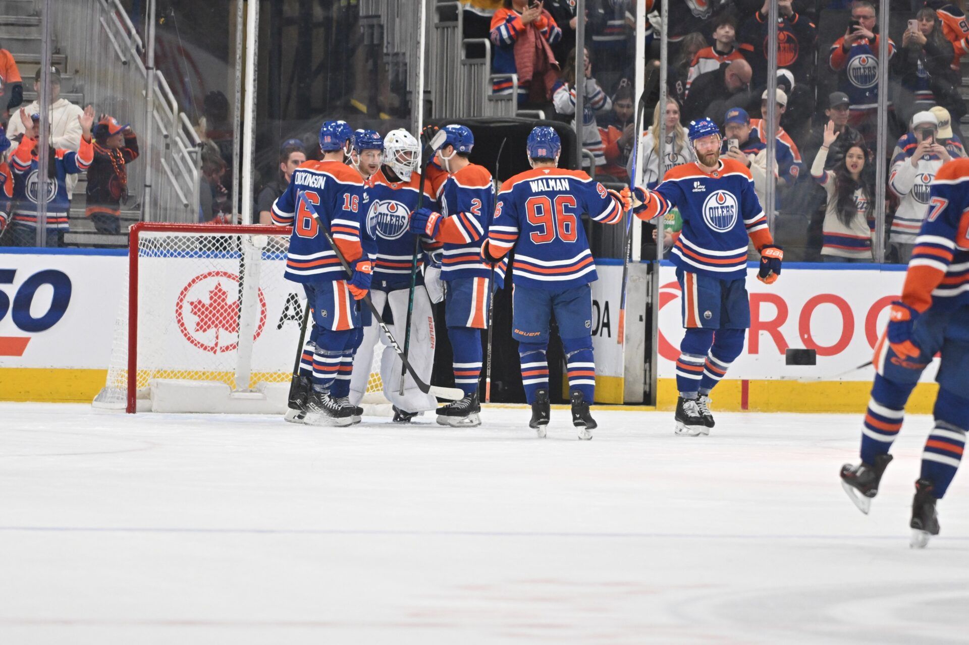 Edmonton Oilers center Jason Dickinson (16), Edmonton Oilers goalie Connor Ingram (39) and Oilers defenseman Evan Bouchard (2) celebrate the win over the Nashville Predators during the third period at Rogers Place.