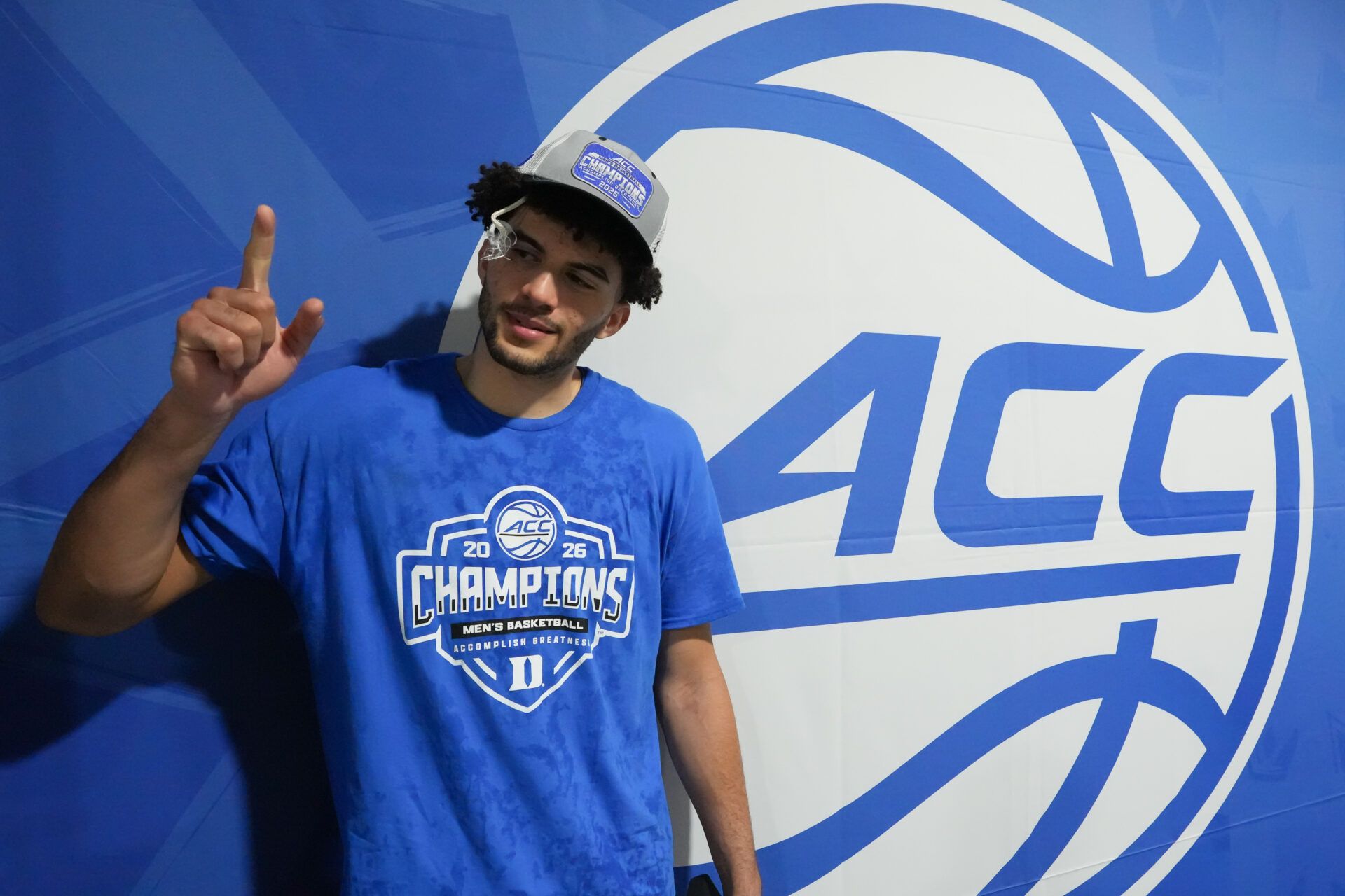 Duke Blue Devils forward Cameron Boozer (12) celebrates after defeating the Virginia Cavaliers in the men's ACC Conference Tournament Championship at Spectrum Center.