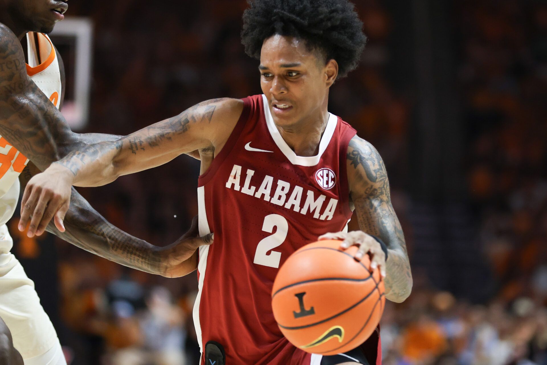 Alabama Crimson Tide guard Aden Holloway (2) moves the ball against the Tennessee Volunteers during the second half at Thompson-Boling Arena at Food City Center.