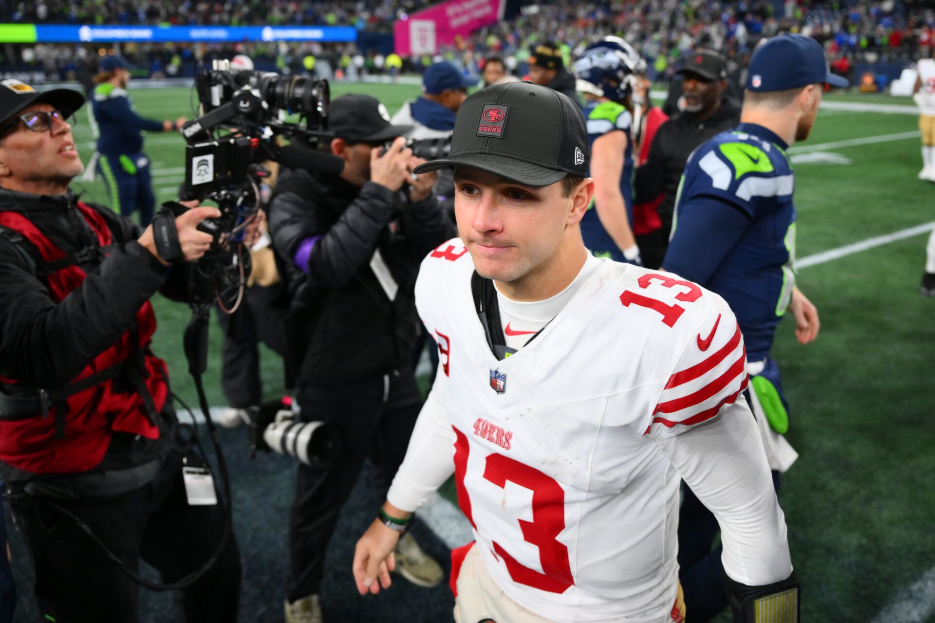San Francisco 49ers quarterback Brock Purdy (13) leaves the field following an NFC Divisional Round game against the Seattle Seahawks at Lumen Field.