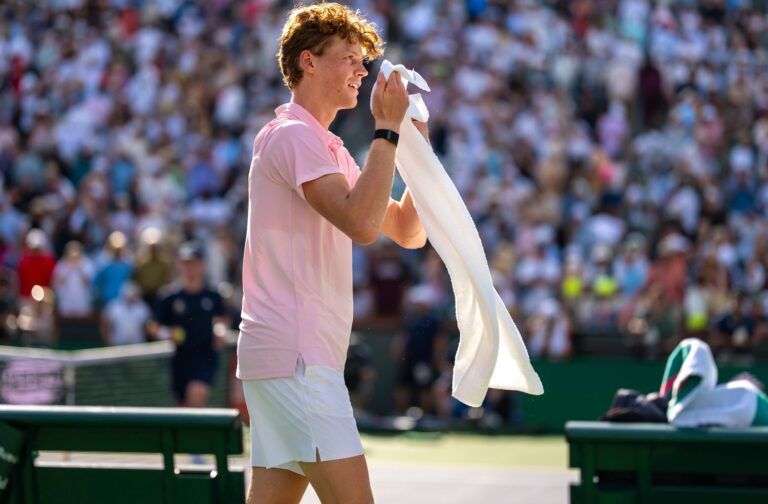 Jannik Sinner cools off with a towel as he looks to his box with a smile after winning the menÕs singles championship final at the BNP Paribas Open in Indian Wells, Calif., Sunday, March 15, 2026.