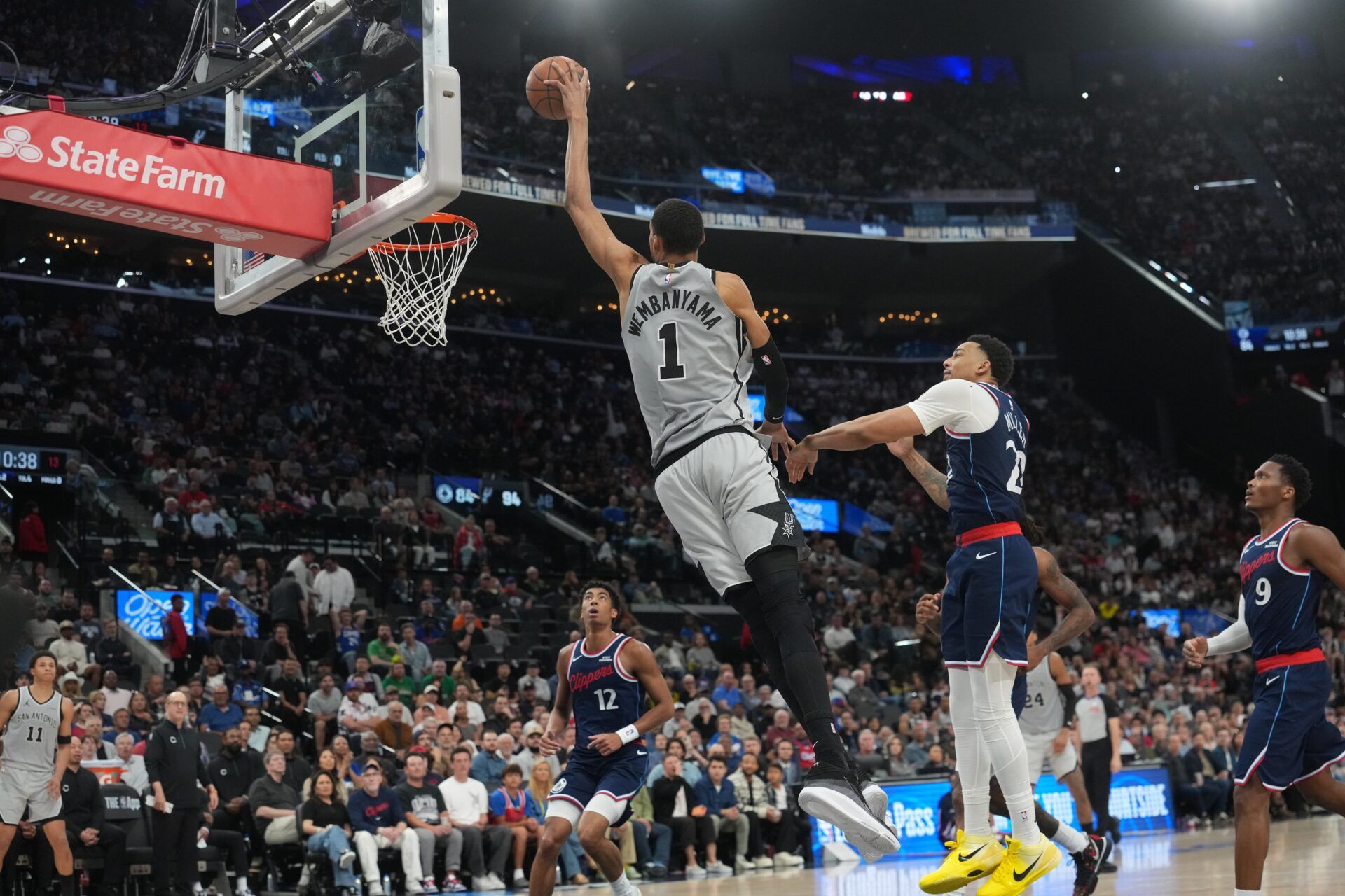 San Antonio Spurs forward Victor Wembanyama (1) dunks the ball against LA Clippers guard Jordan Miller (22) in the second  half at Intuit Dome.