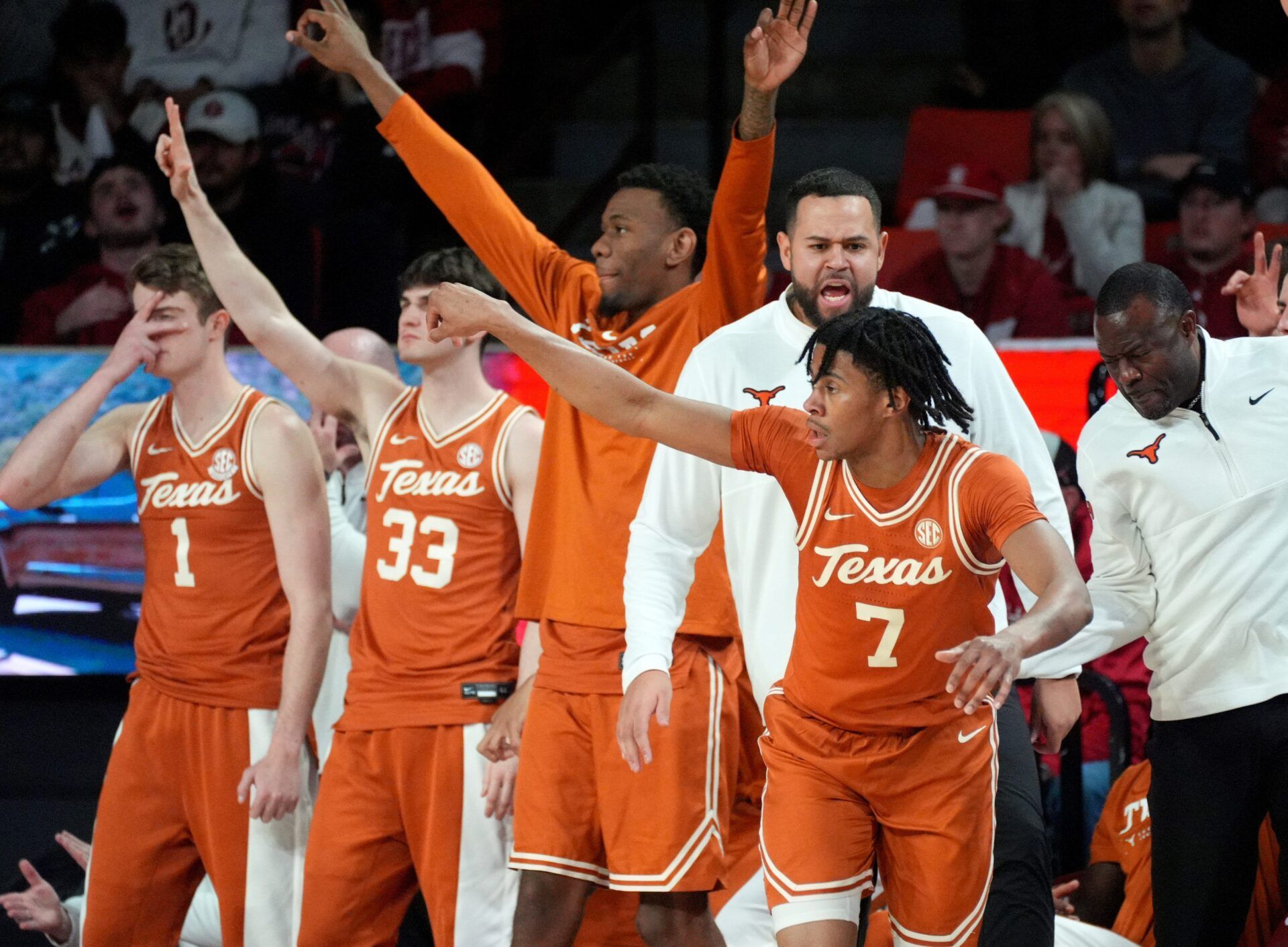 Texas' Simeon Wilcher (7) celebrates a 3-point basket in the second half of the men's college basketball game between the Oklahoma Sooners and the Texas Longhorns at Lloyd Noble Center in Norman, Okla., Saturday Jan. 31, 2026.