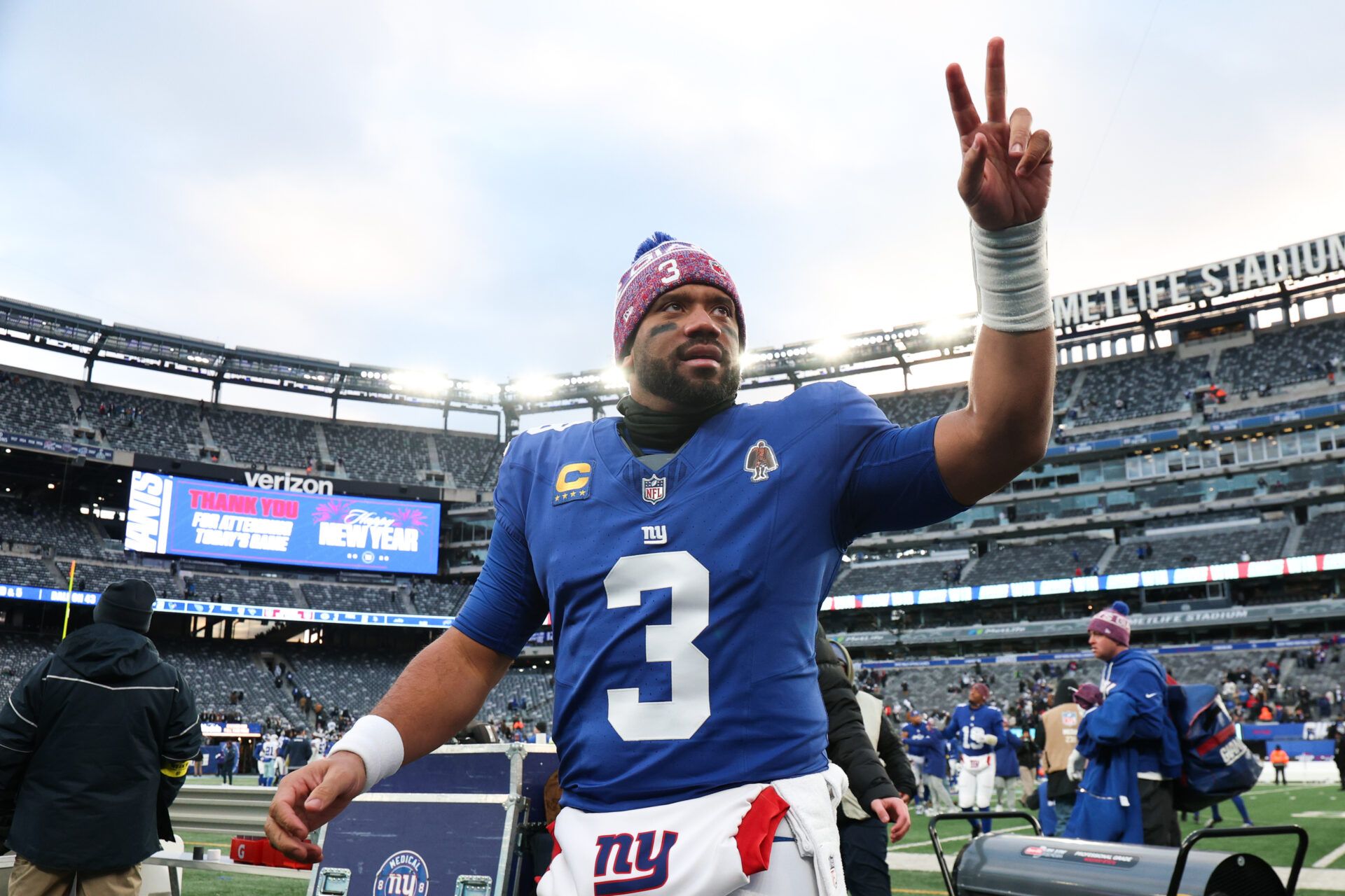 New York Giants quarterback Russell Wilson (3) waves to fans after the game against the Dallas Cowboys at MetLife Stadium.