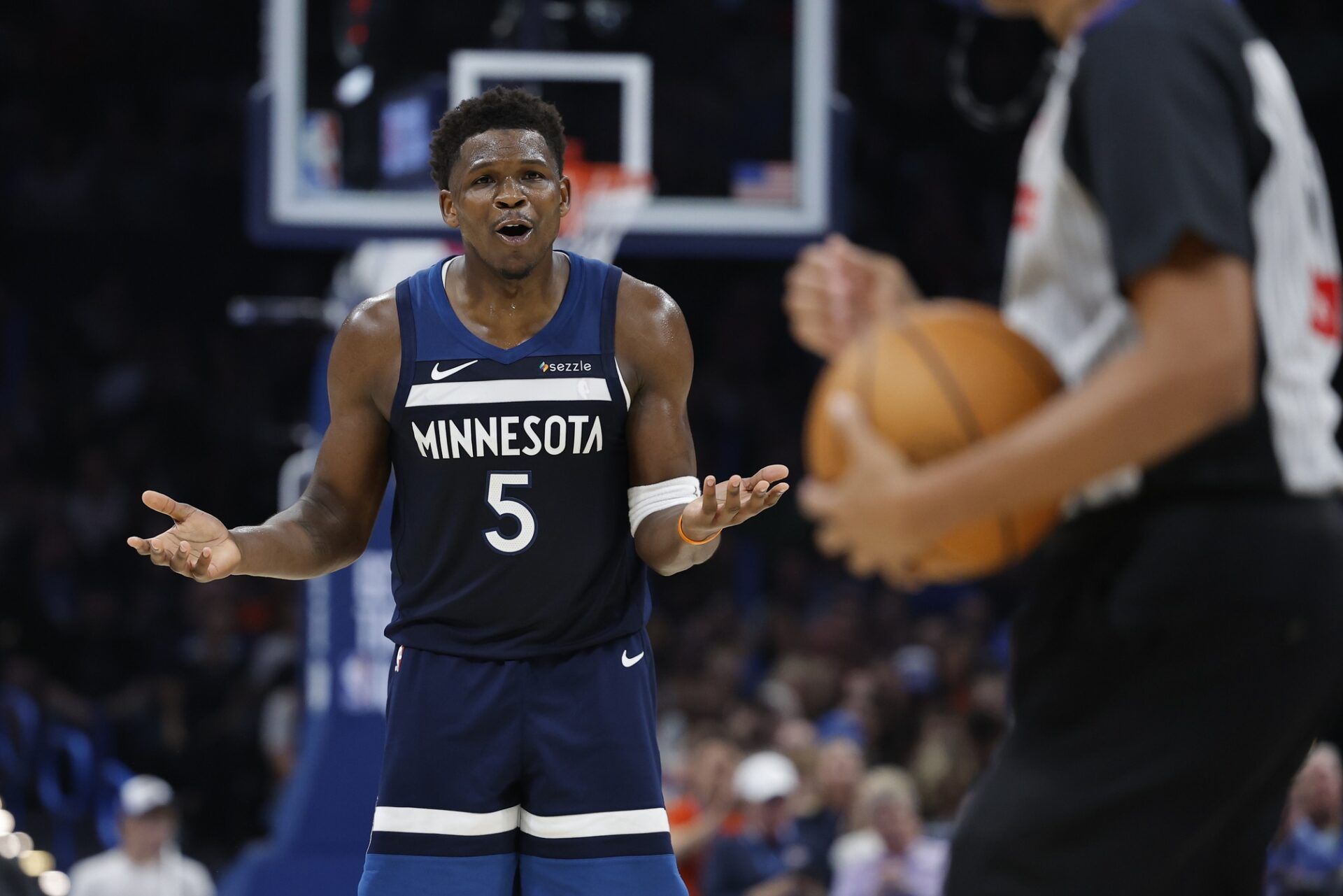 Minnesota Timberwolves guard Anthony Edwards (5) reacts after a call against him by an official during the second half against the Oklahoma City Thunder at Paycom Center.