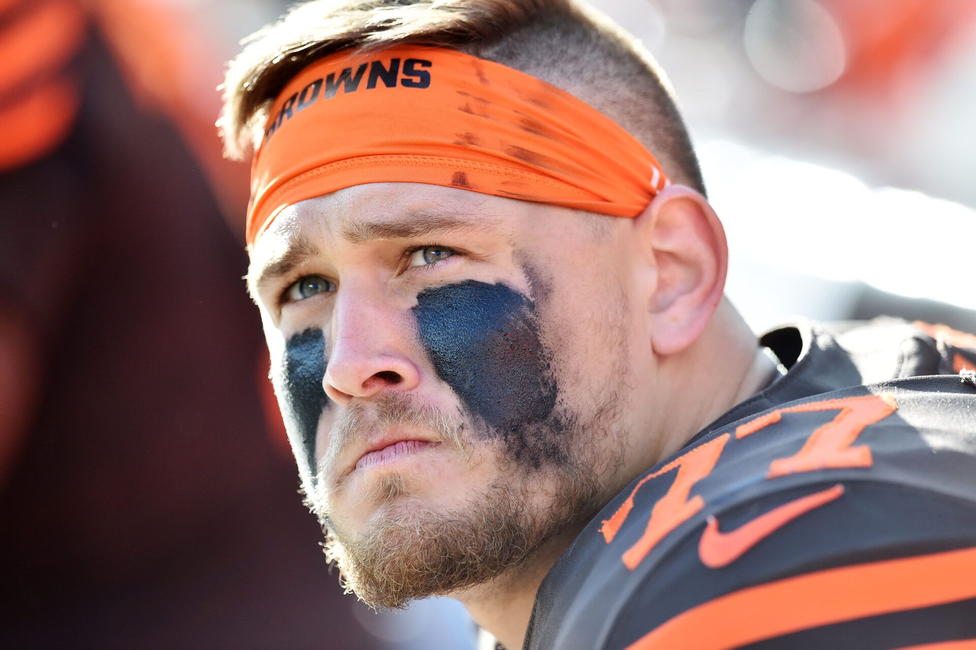 Cleveland Browns offensive guard Wyatt Teller (77) watches from the bench during the fourth quarter against the Seattle Seahawks at FirstEnergy Stadium.