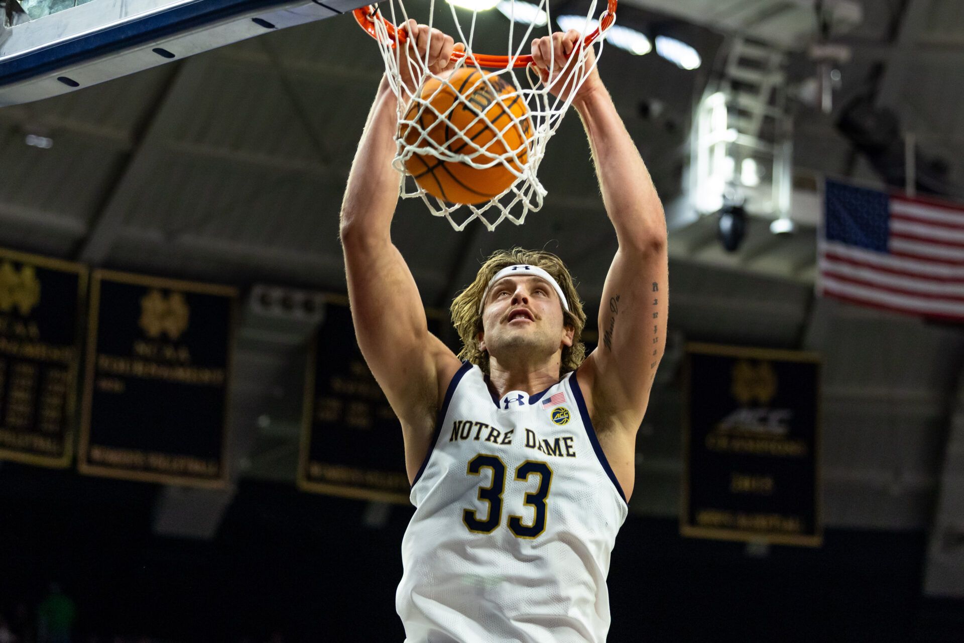 Notre Dame Fighting Irish forward Carson Towt (33) dunks against the NC State Wolfpack during the first half at Purcell Pavilion at the Joyce Center.