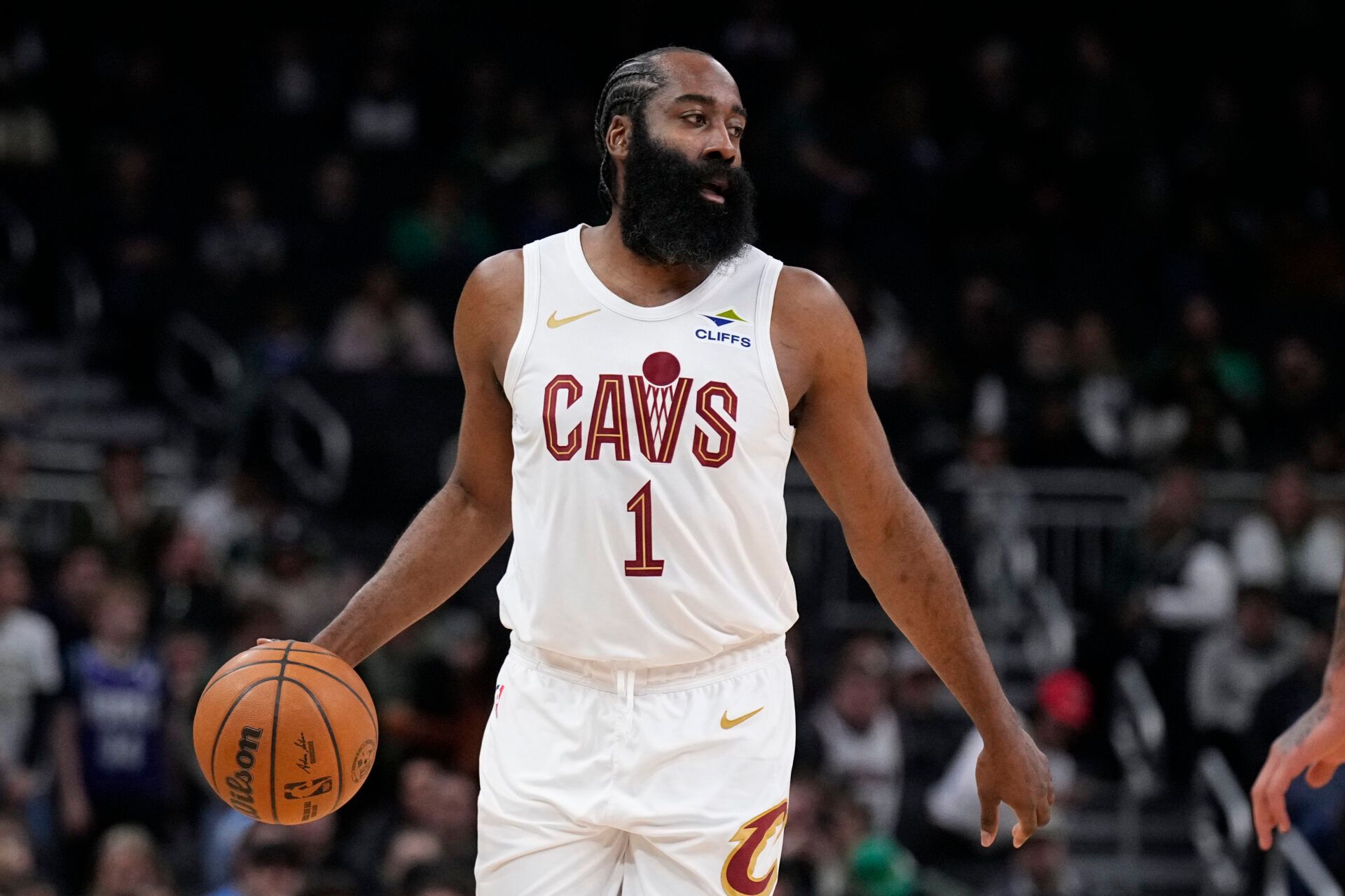 Cleveland Cavaliers guard James Harden (1) brings the ball up court against the Milwaukee Bucks in the first half at Fiserv Forum.