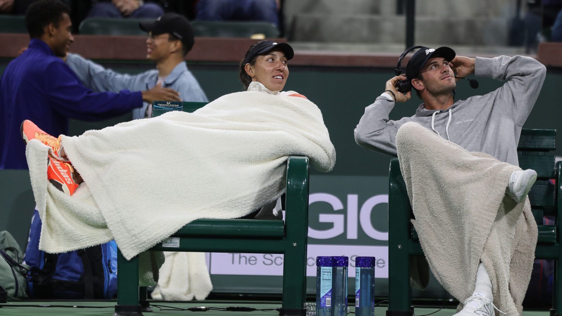 Jessica Pegula, left, keeps warm on the sidelines during the Tie Break Tens event in the Eisenhower Cup in Indian Wells, Calif., March 7, 2023.

Eisenhower Cup 5