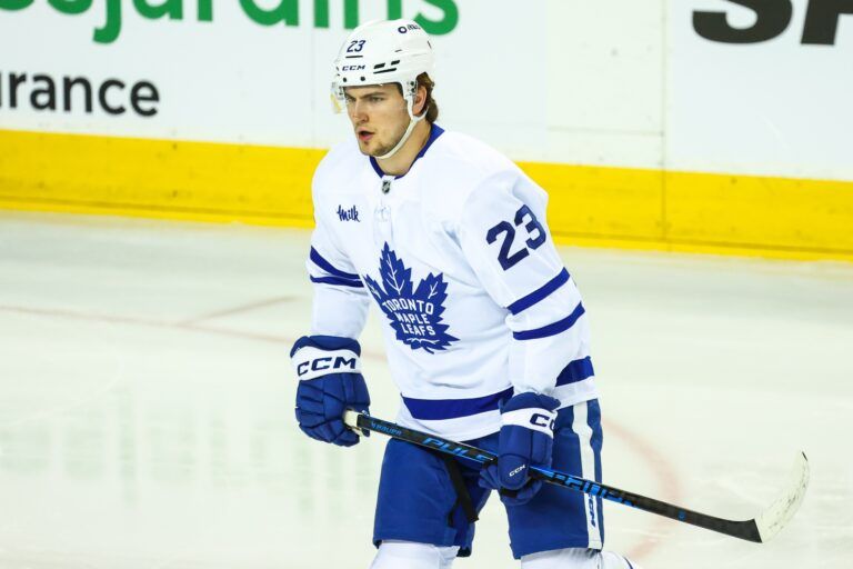 Toronto Maple Leafs left wing Matthew Knies (23) skates during the warmup period against the Calgary Flames at Scotiabank Saddledome.