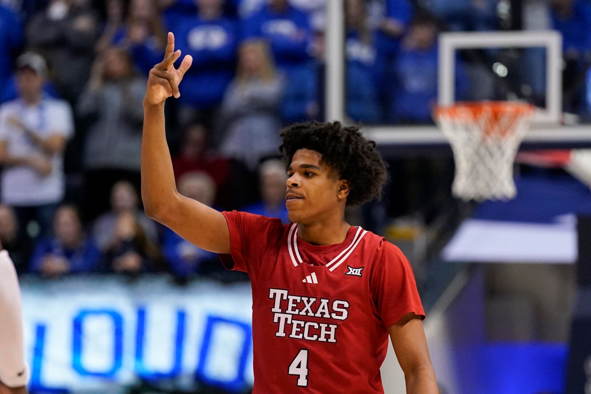 Texas Tech Red Raiders guard Christian Anderson (4) reacts to a made three point shot during the second half against the BYU Cougars at Marriott Center.