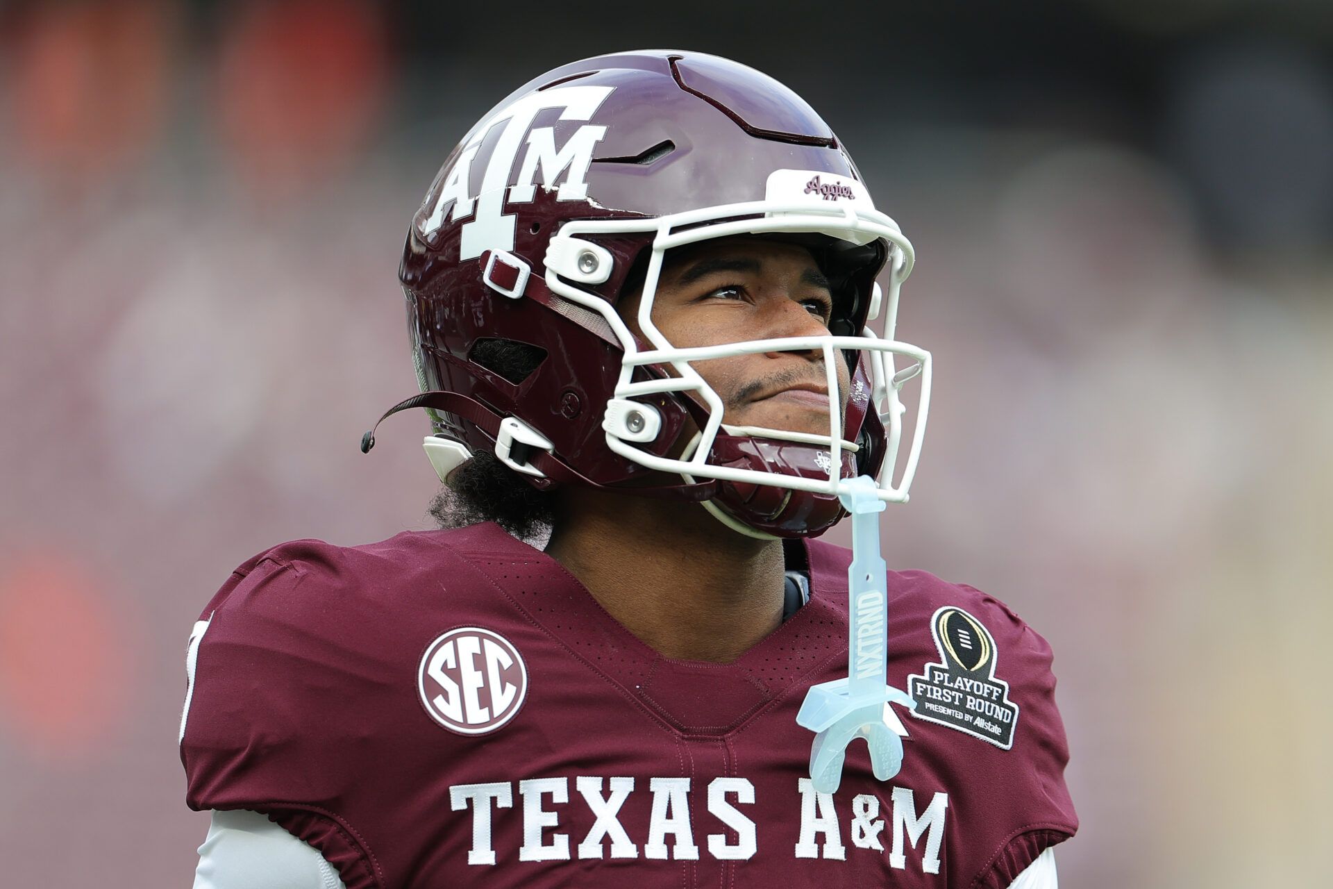 COLLEGE STATION, TEXAS - DECEMBER 20: KC Concepcion #7 of the Texas A&M Aggies warms up prior to the 2025 College Football Playoff First Round Game against the Miami Hurricanes at Kyle Field on December 20, 2025 in College Station, Texas.  (Photo by Alex Slitz/Getty Images)