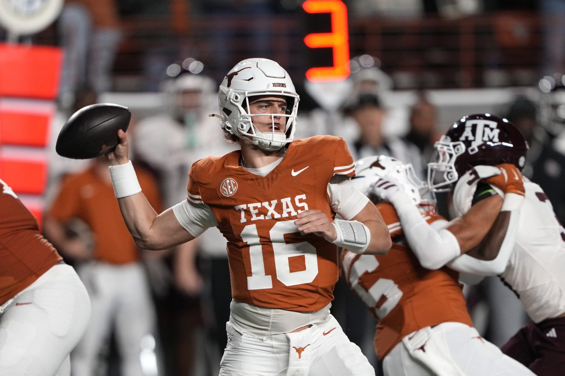 Texas Longhorns quarterback Arch Manning throws a pass during the first half against the Texas A&M Aggies at Darrell K Royal-Texas Memorial Stadium.
