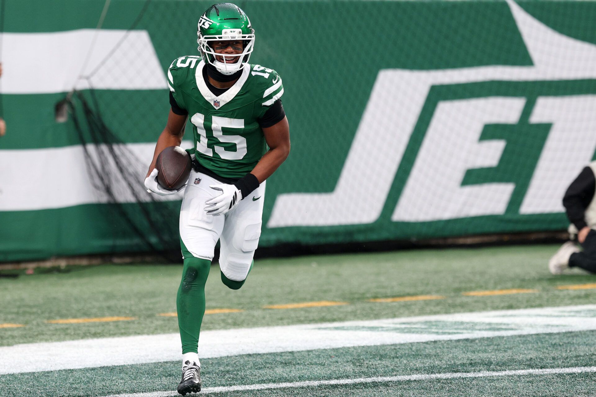 New York Jets wide receiver Adonai Mitchell (15) reacts after a touchdown catch against the Atlanta Falcons during the second half at MetLife Stadium.